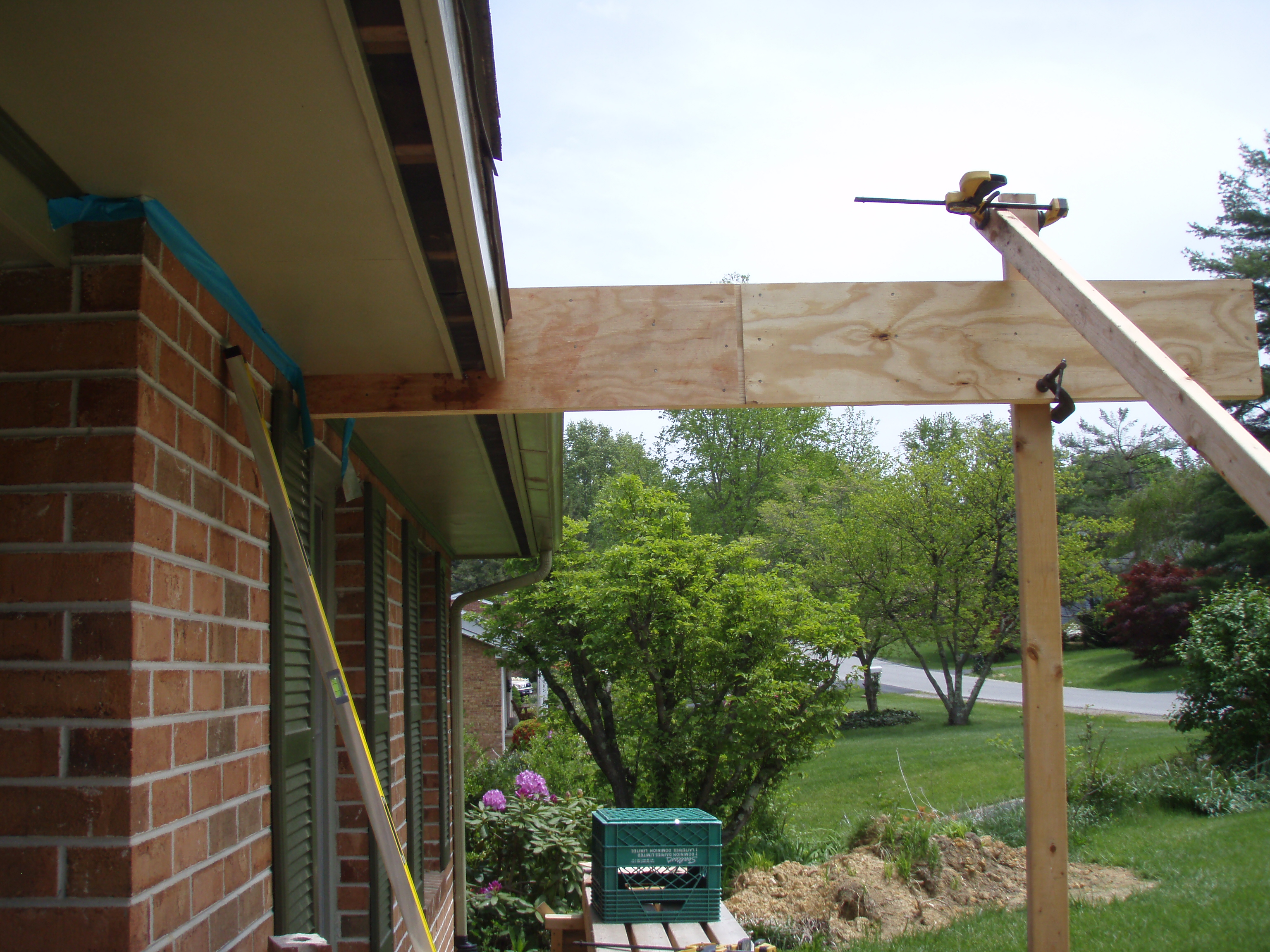 front gable porch with brick raised garden