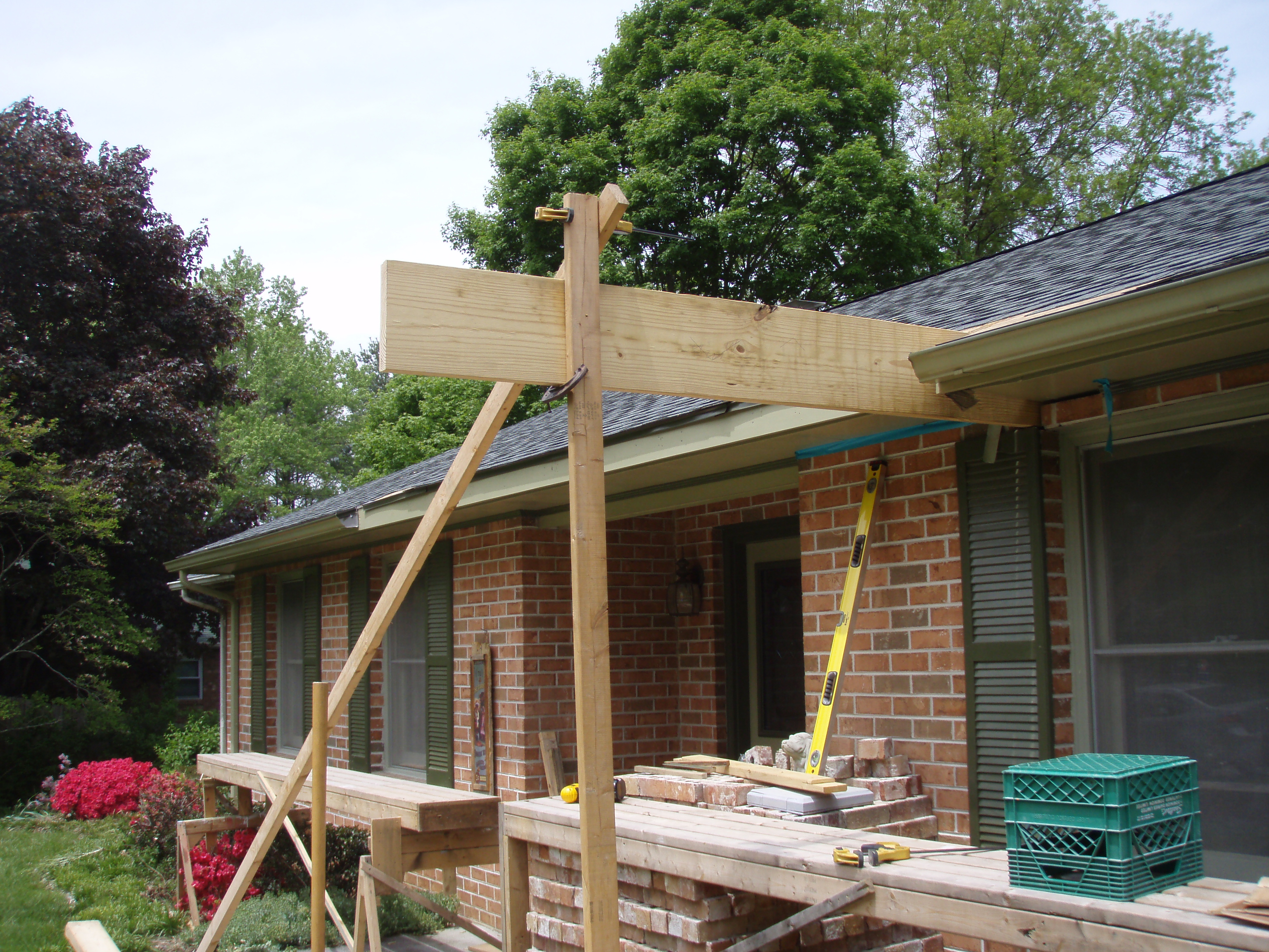 front gable porch with brick raised garden