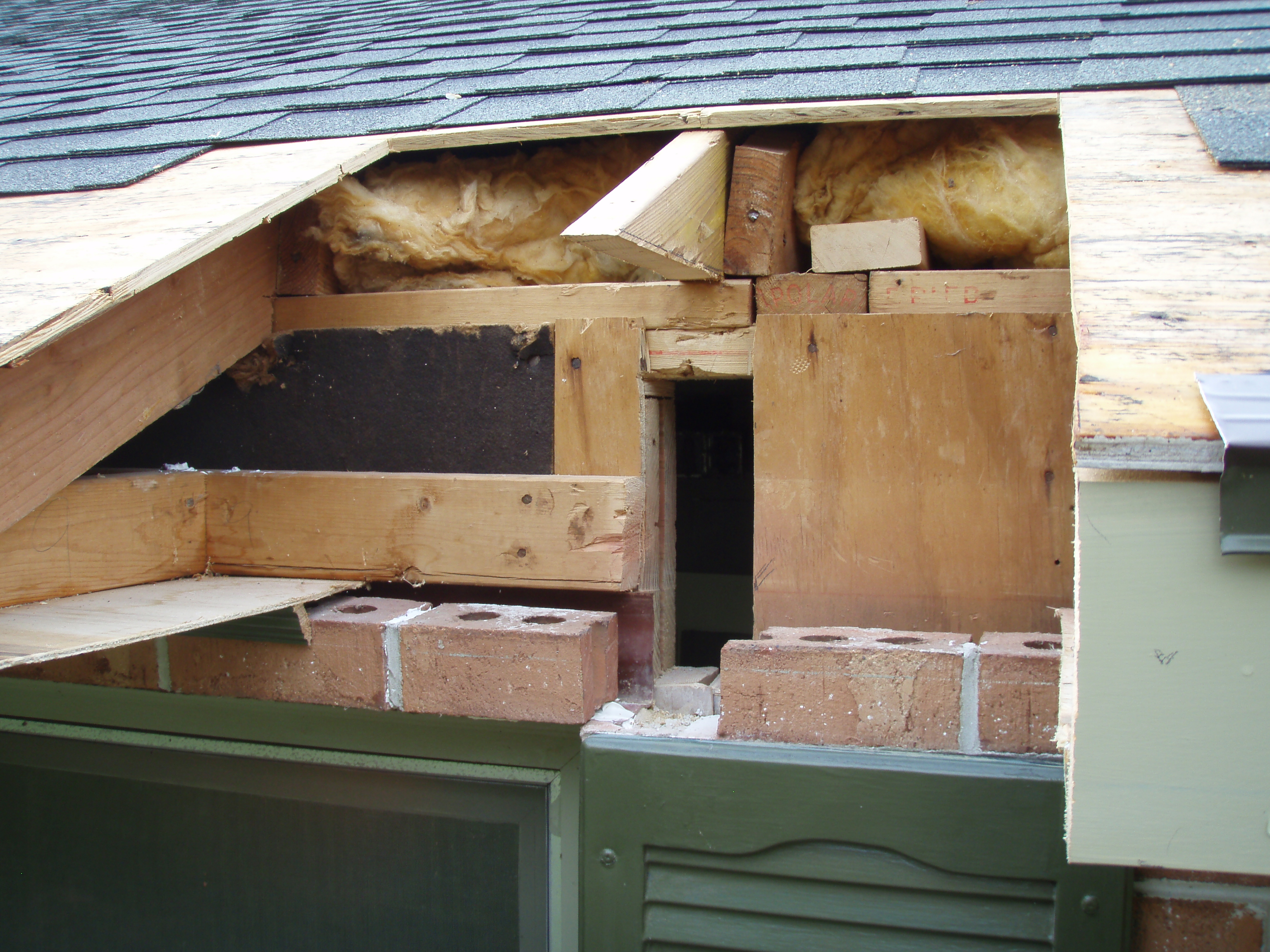 front gable porch with brick raised garden