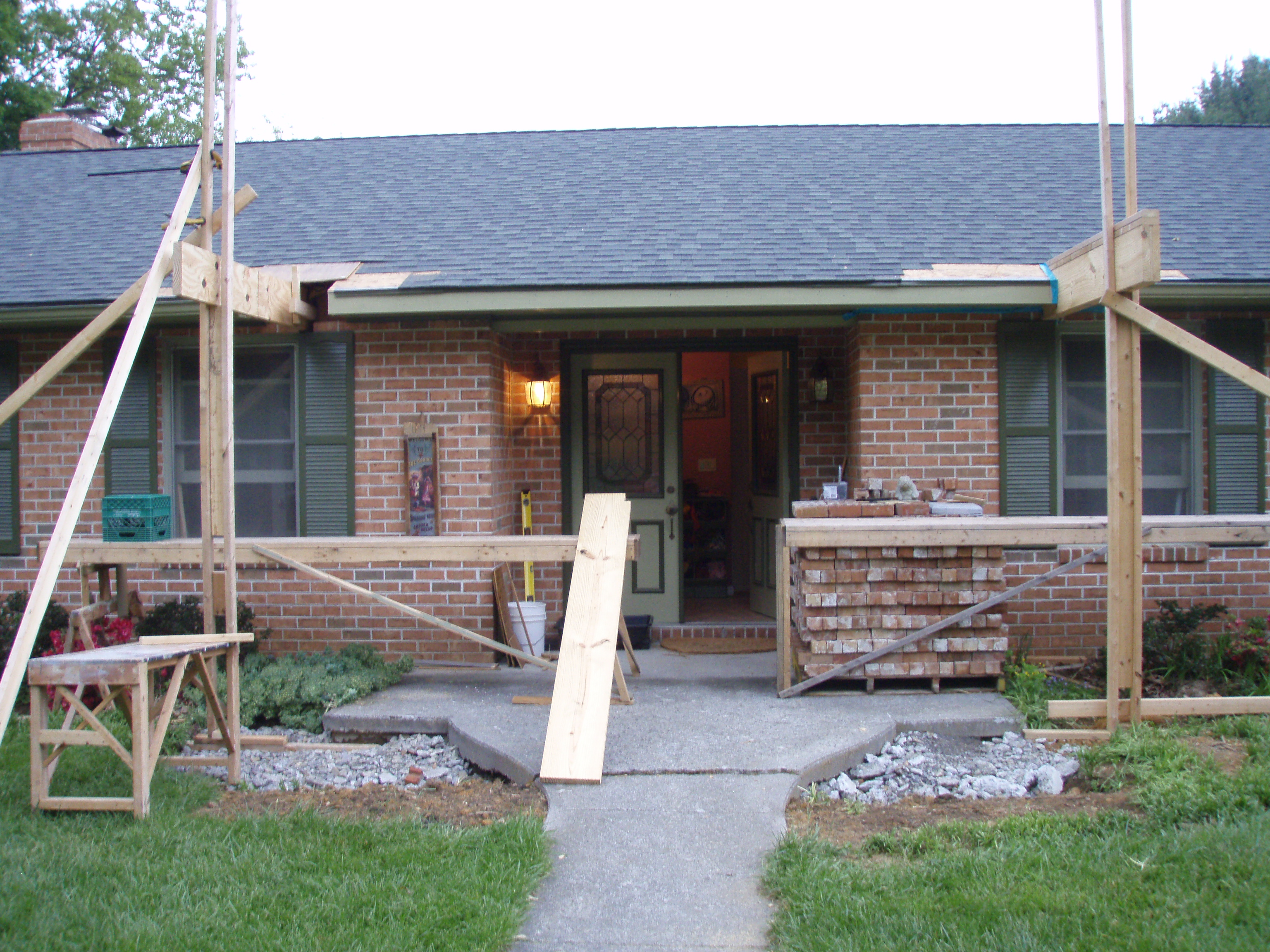 front gable porch with brick raised garden