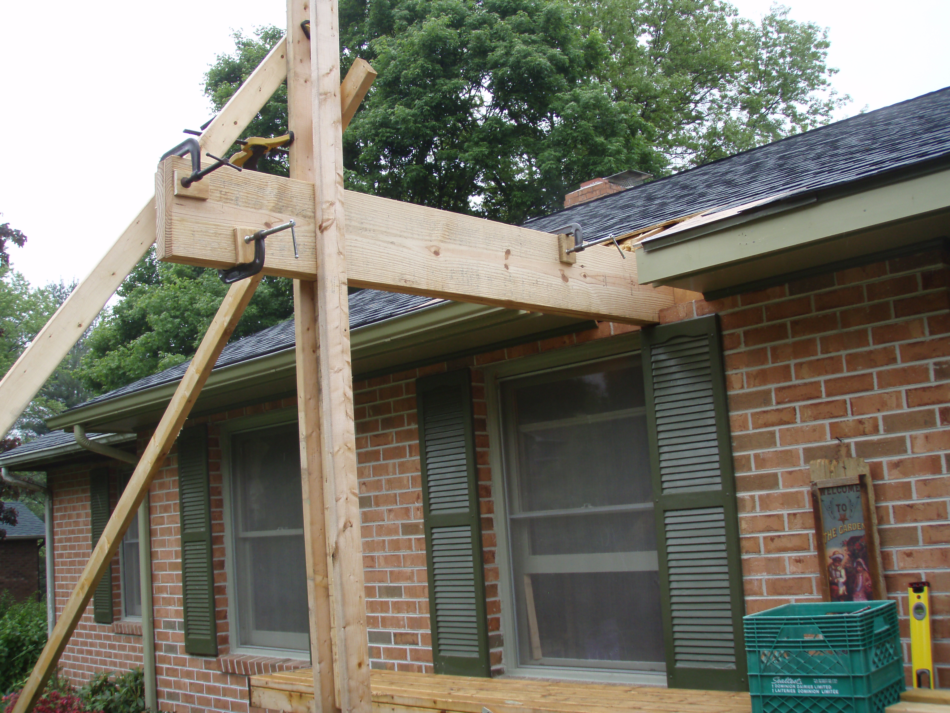 front gable porch with brick raised garden