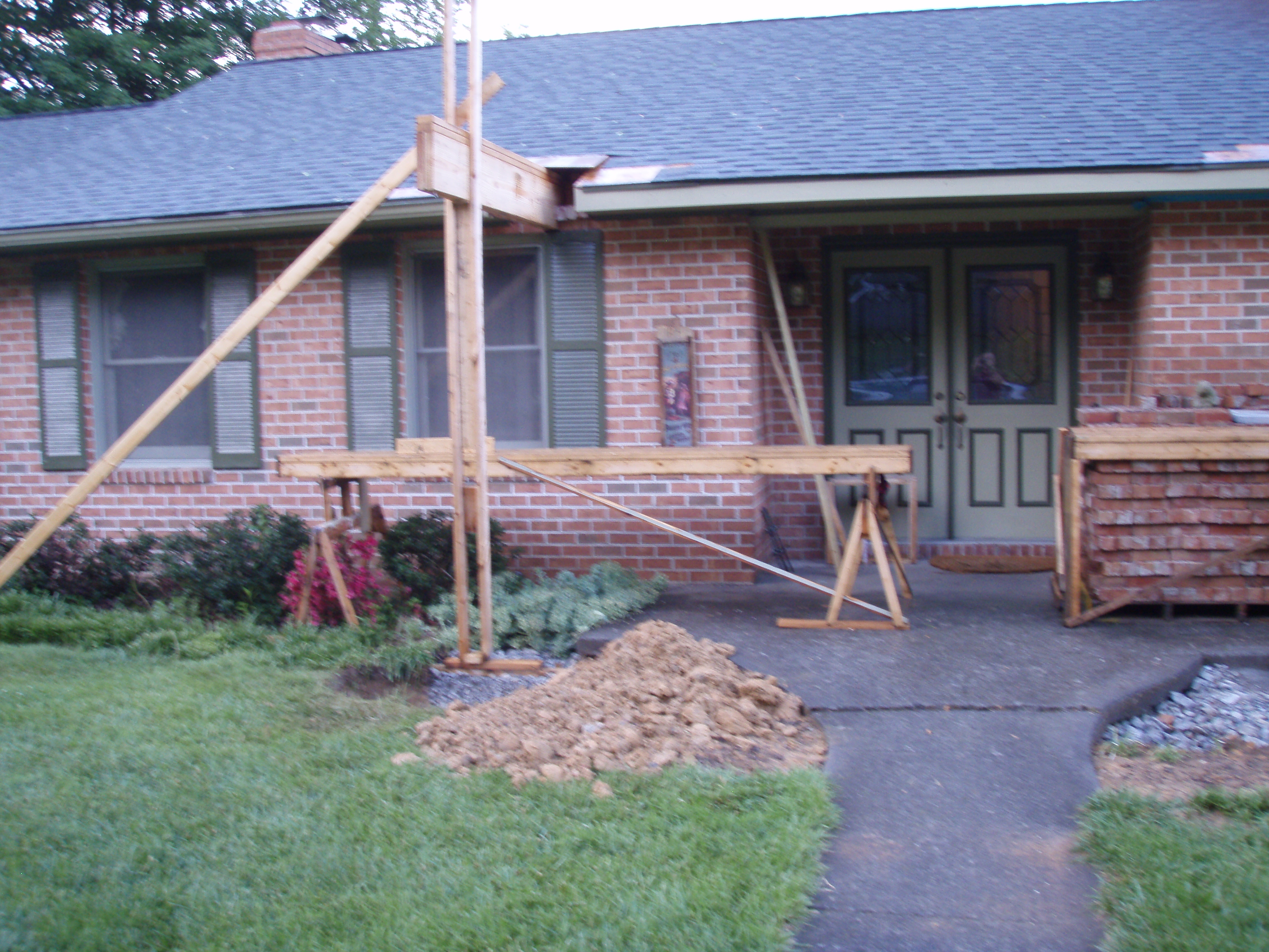 front gable porch with brick raised garden