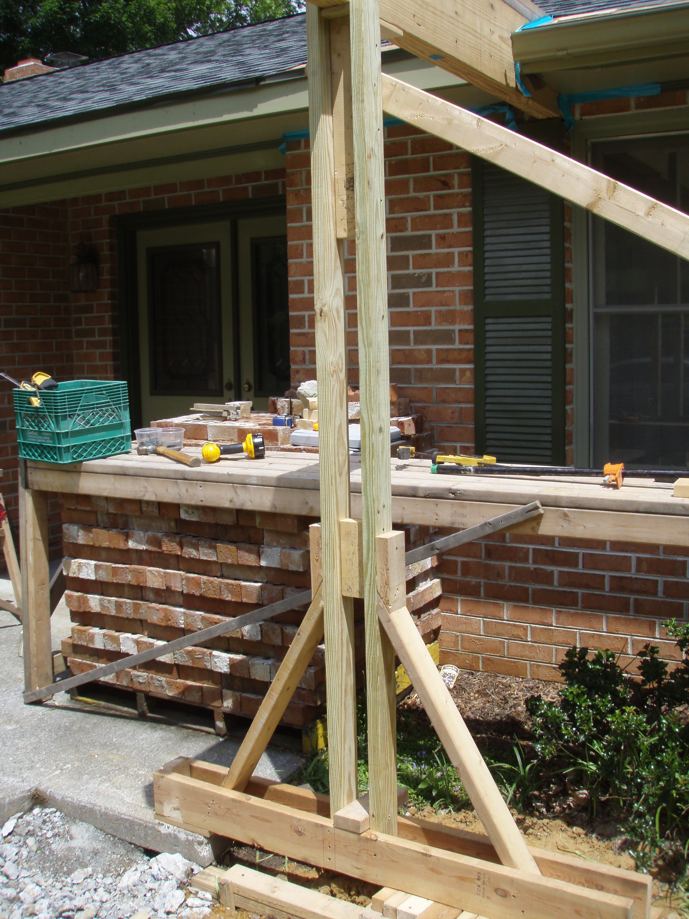 front gable porch with brick raised garden