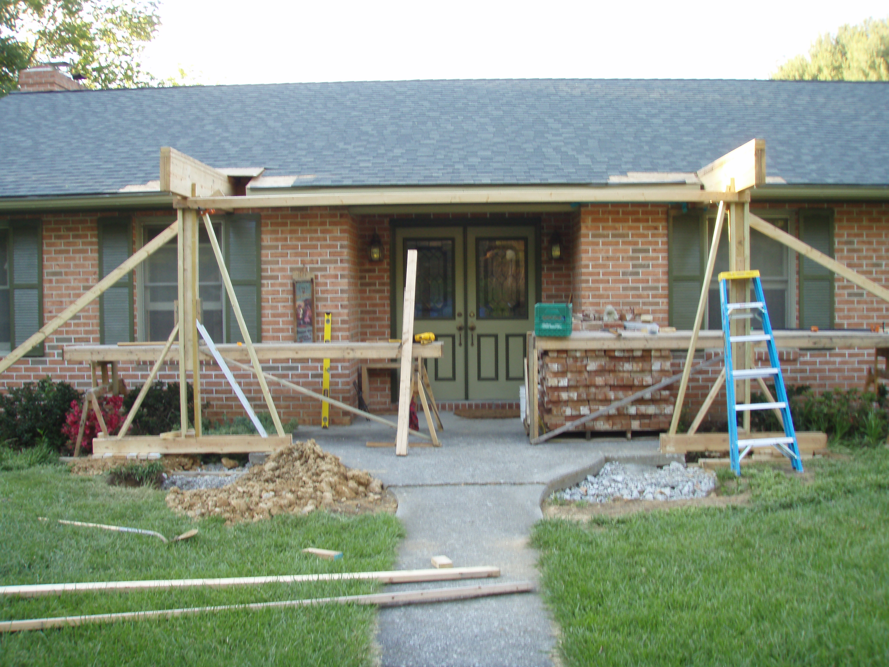 front gable porch with brick raised garden