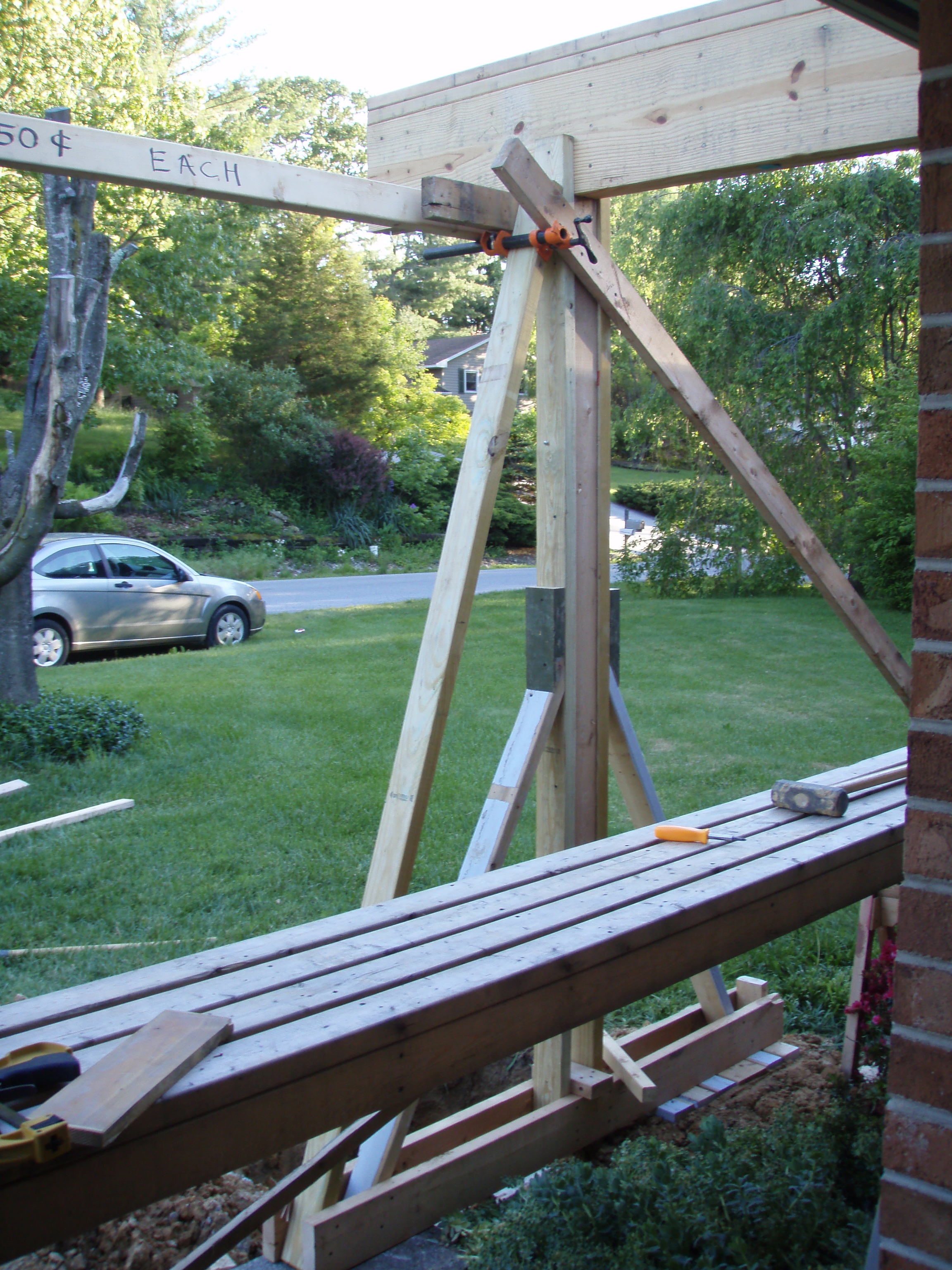 front gable porch with brick raised garden