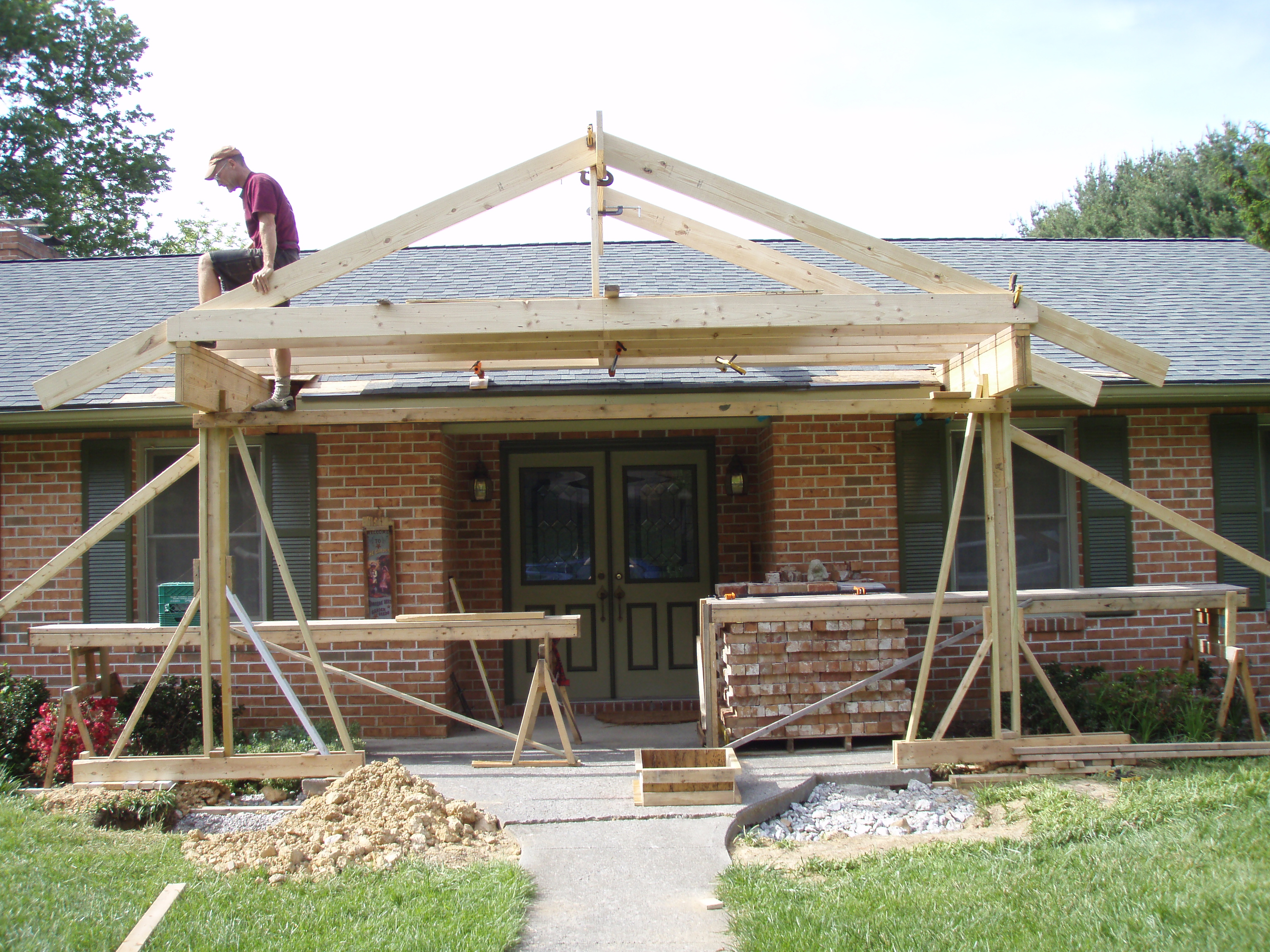 front gable porch with brick raised garden