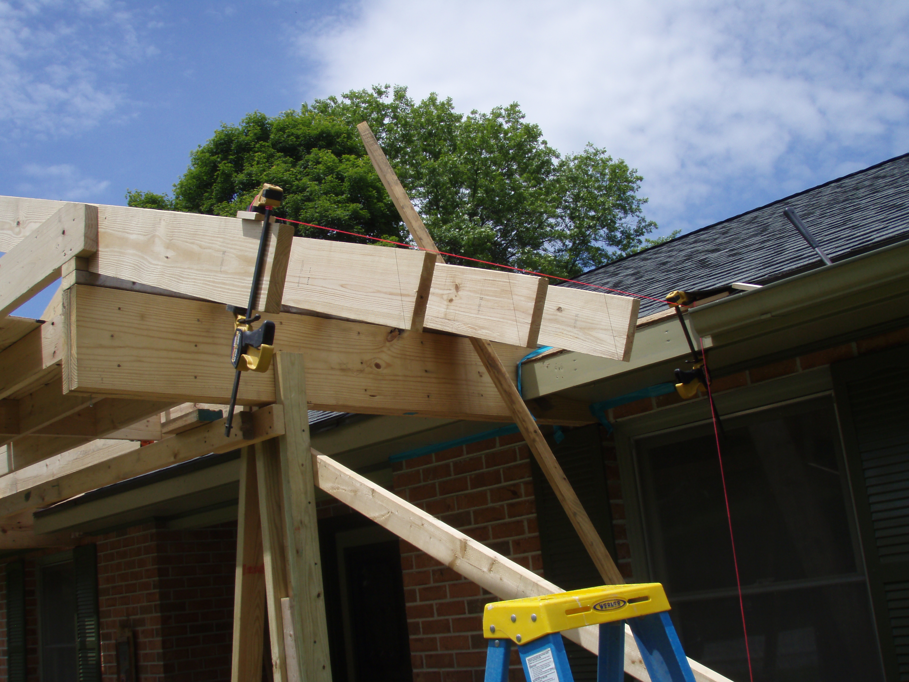 front gable porch with brick raised garden