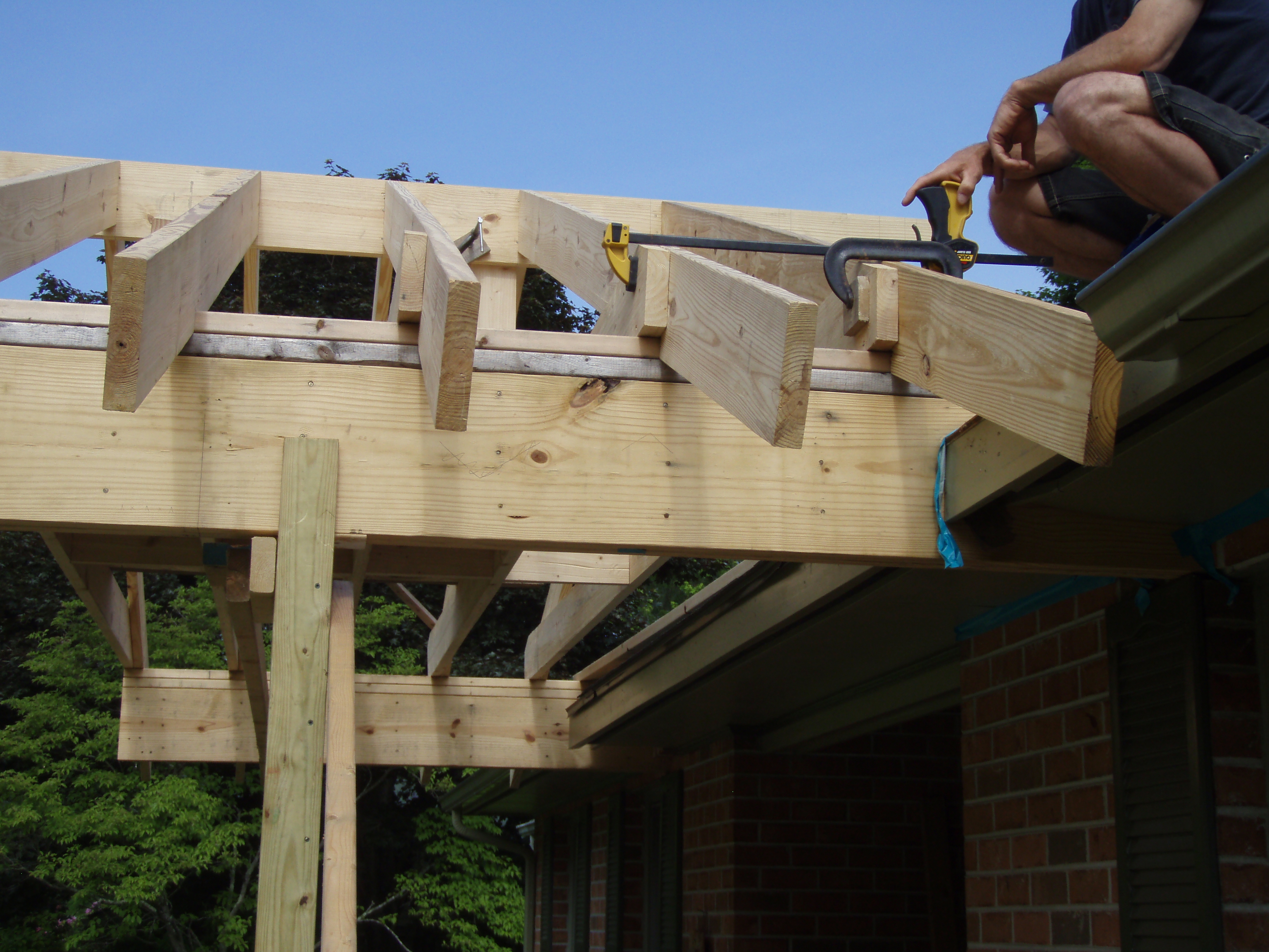 front gable porch with brick raised garden