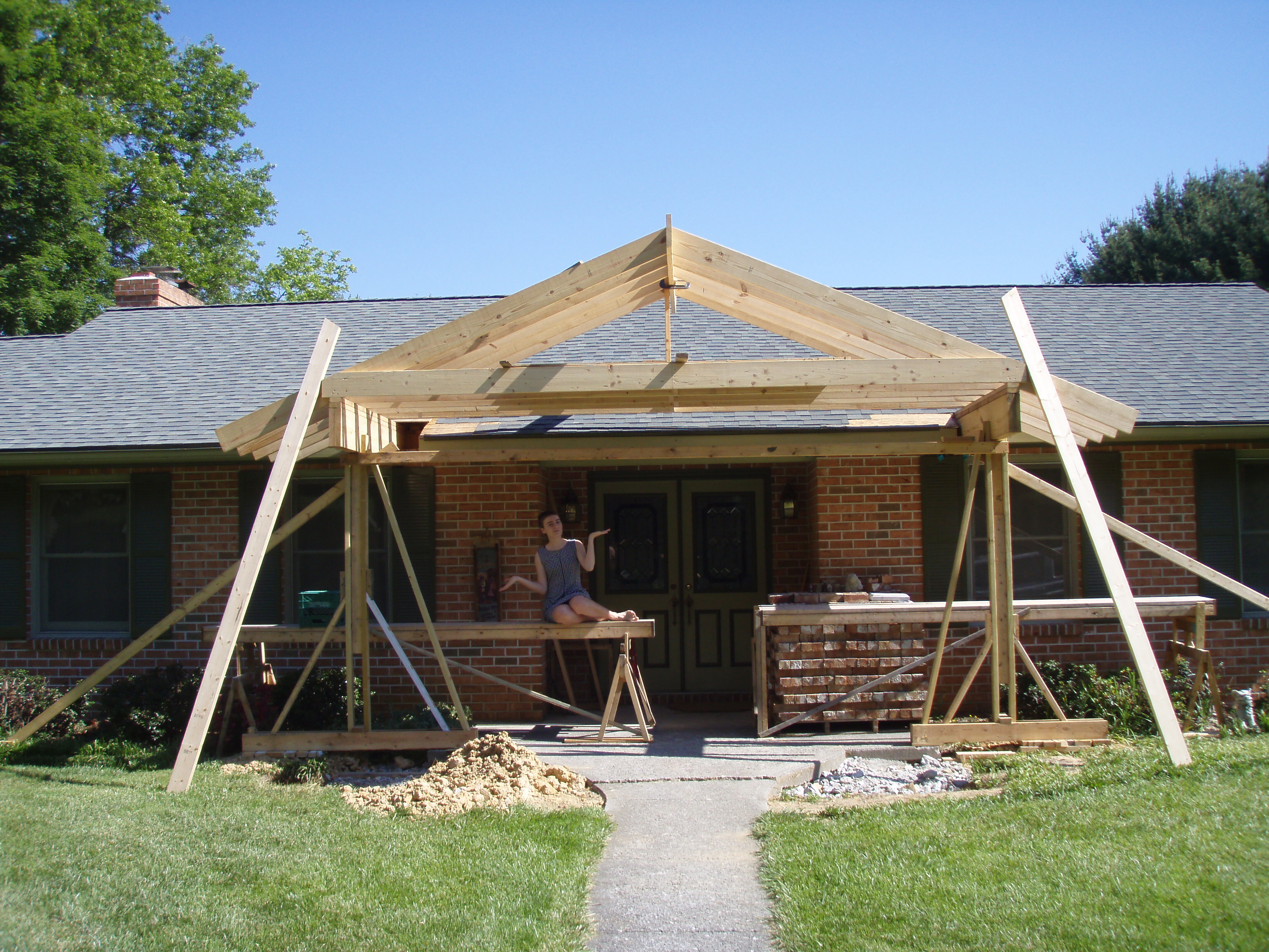 front gable porch with brick raised garden