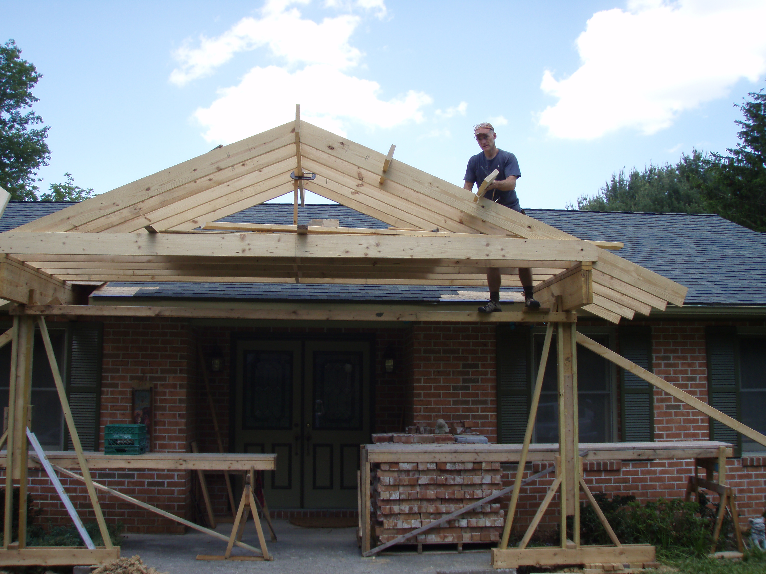 front gable porch with brick raised garden