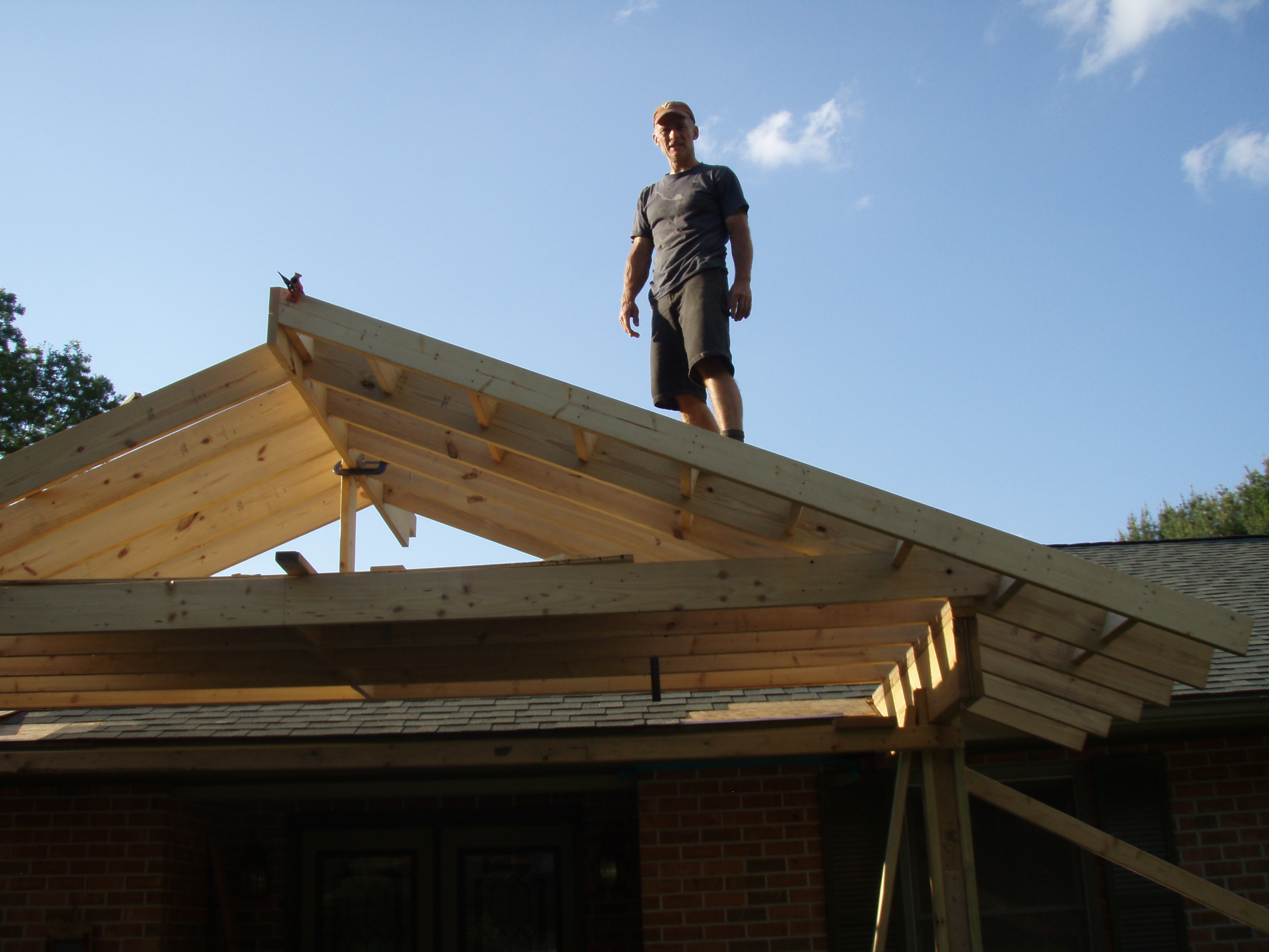 front gable porch with brick raised garden