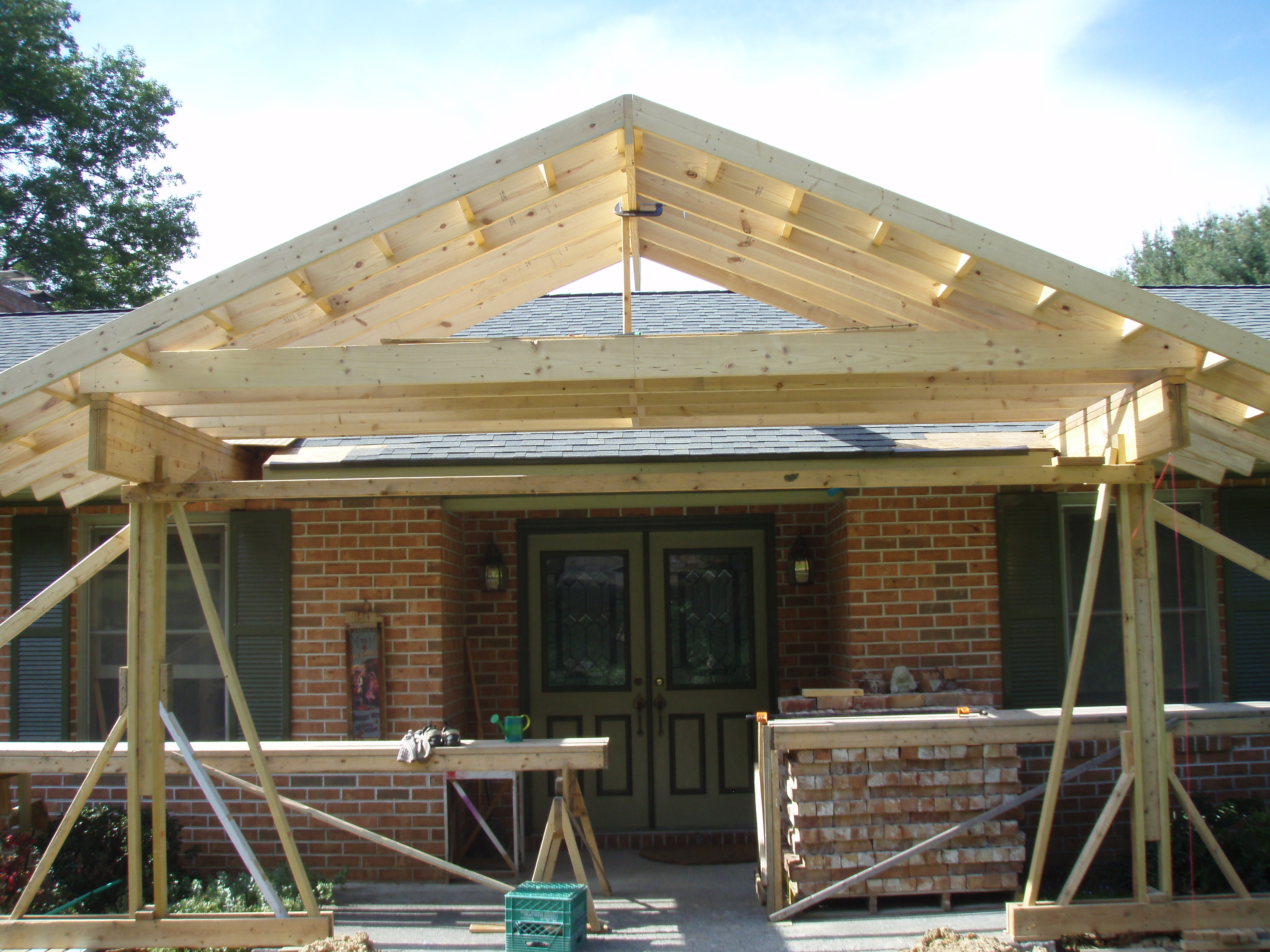 front gable porch with brick raised garden