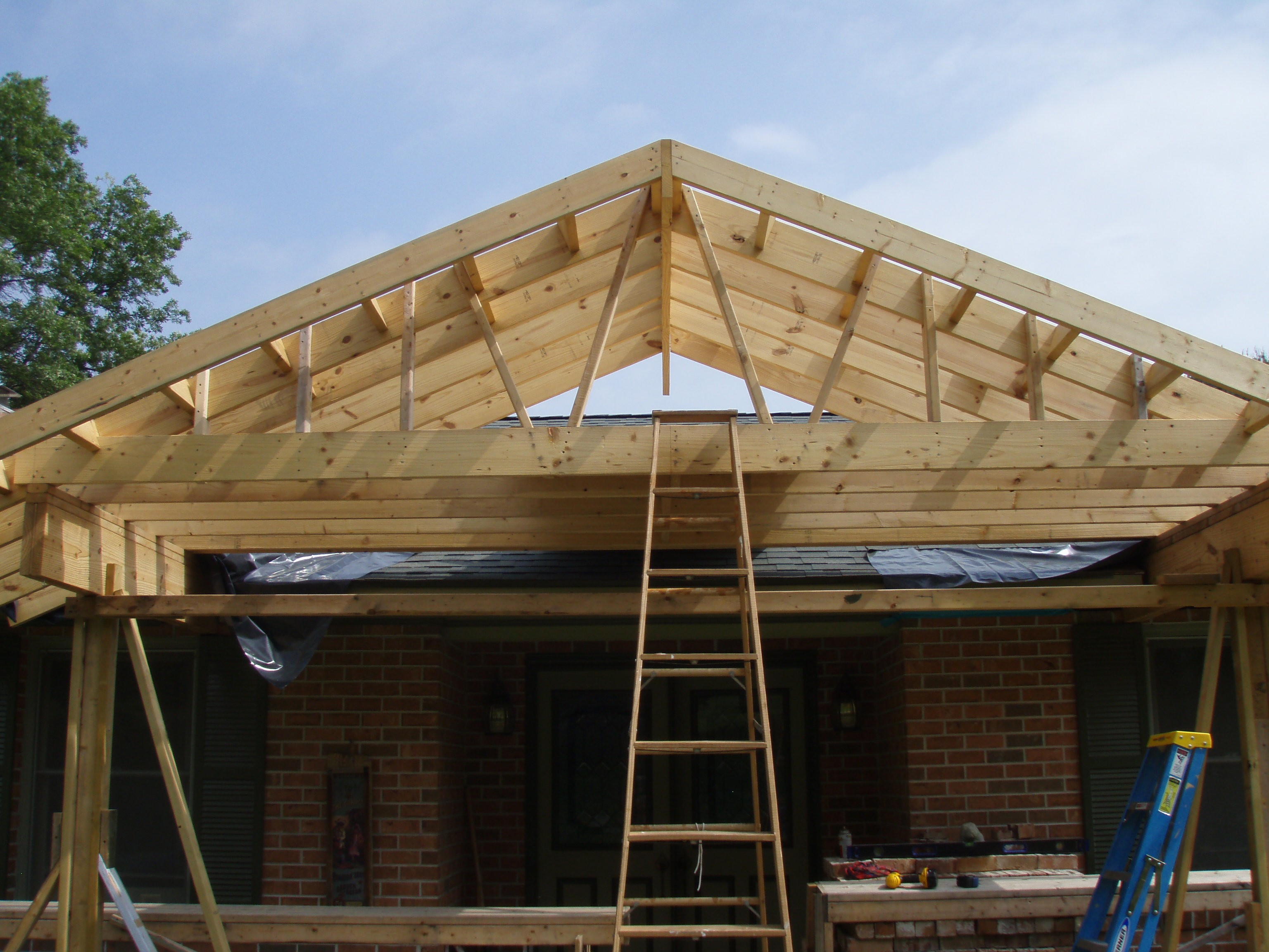 front gable porch with brick raised garden