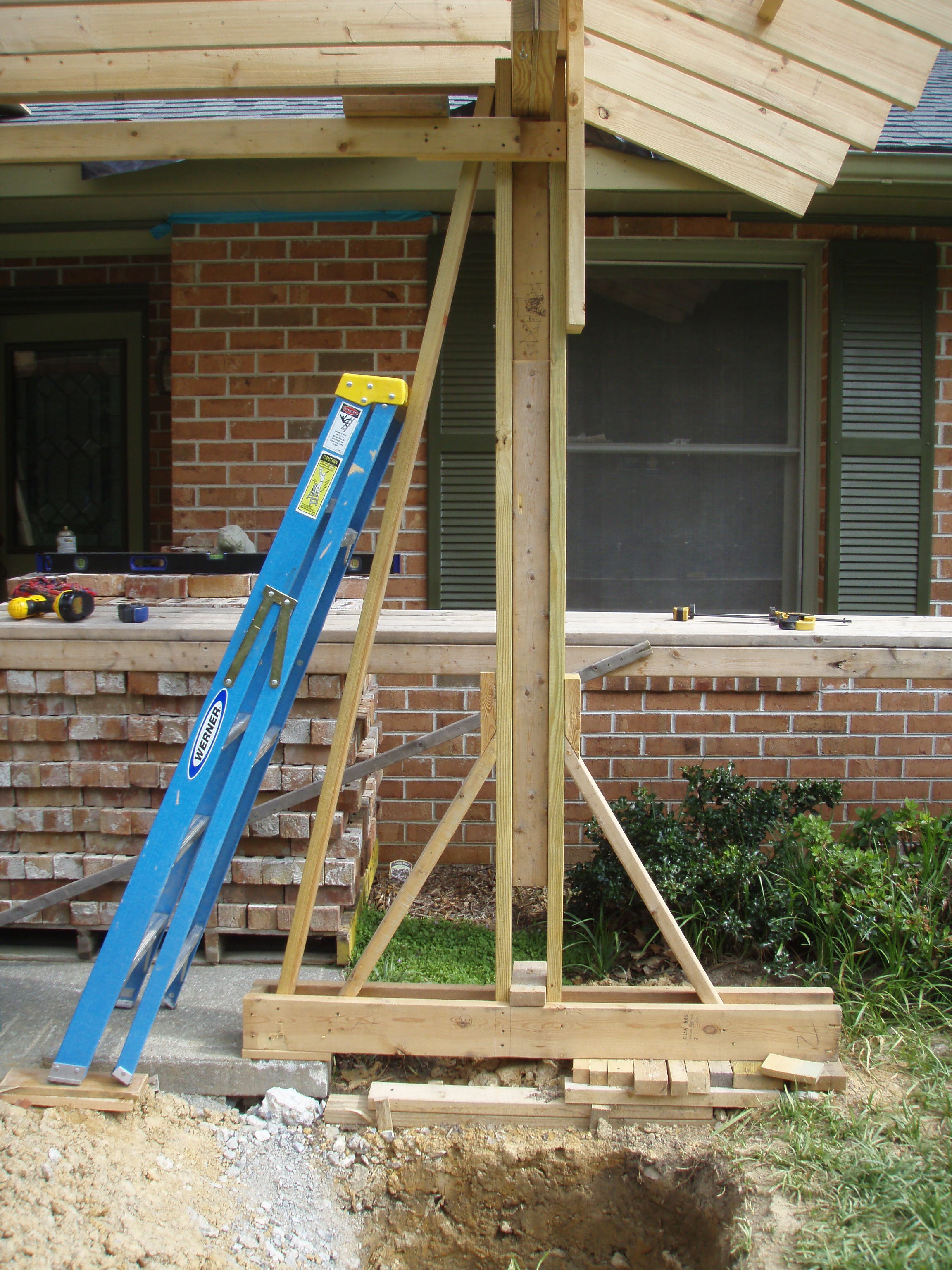 front gable porch with brick raised garden