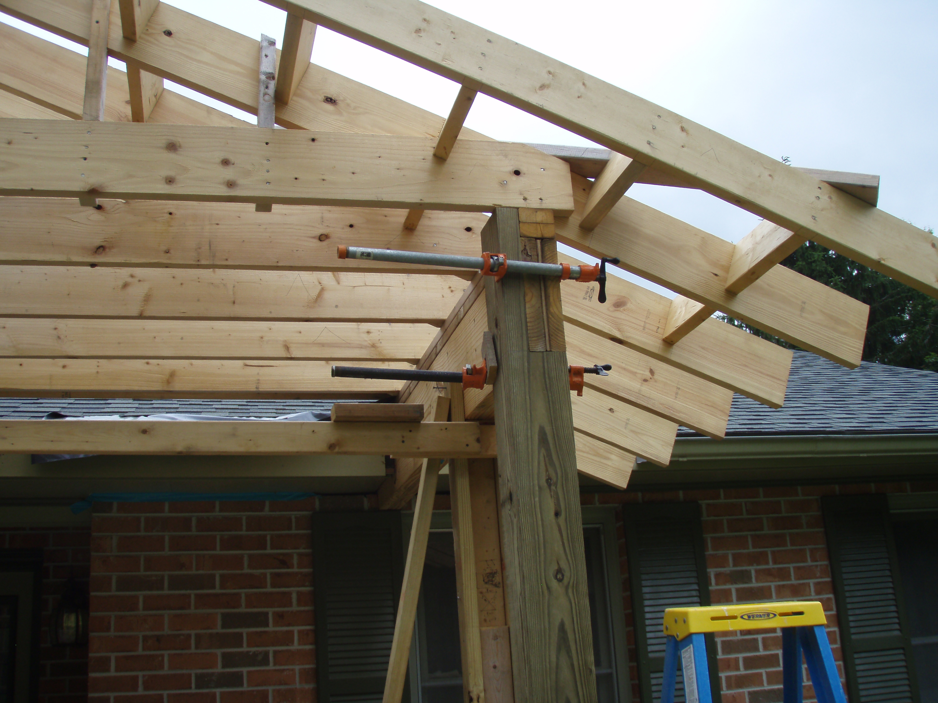 front gable porch with brick raised garden