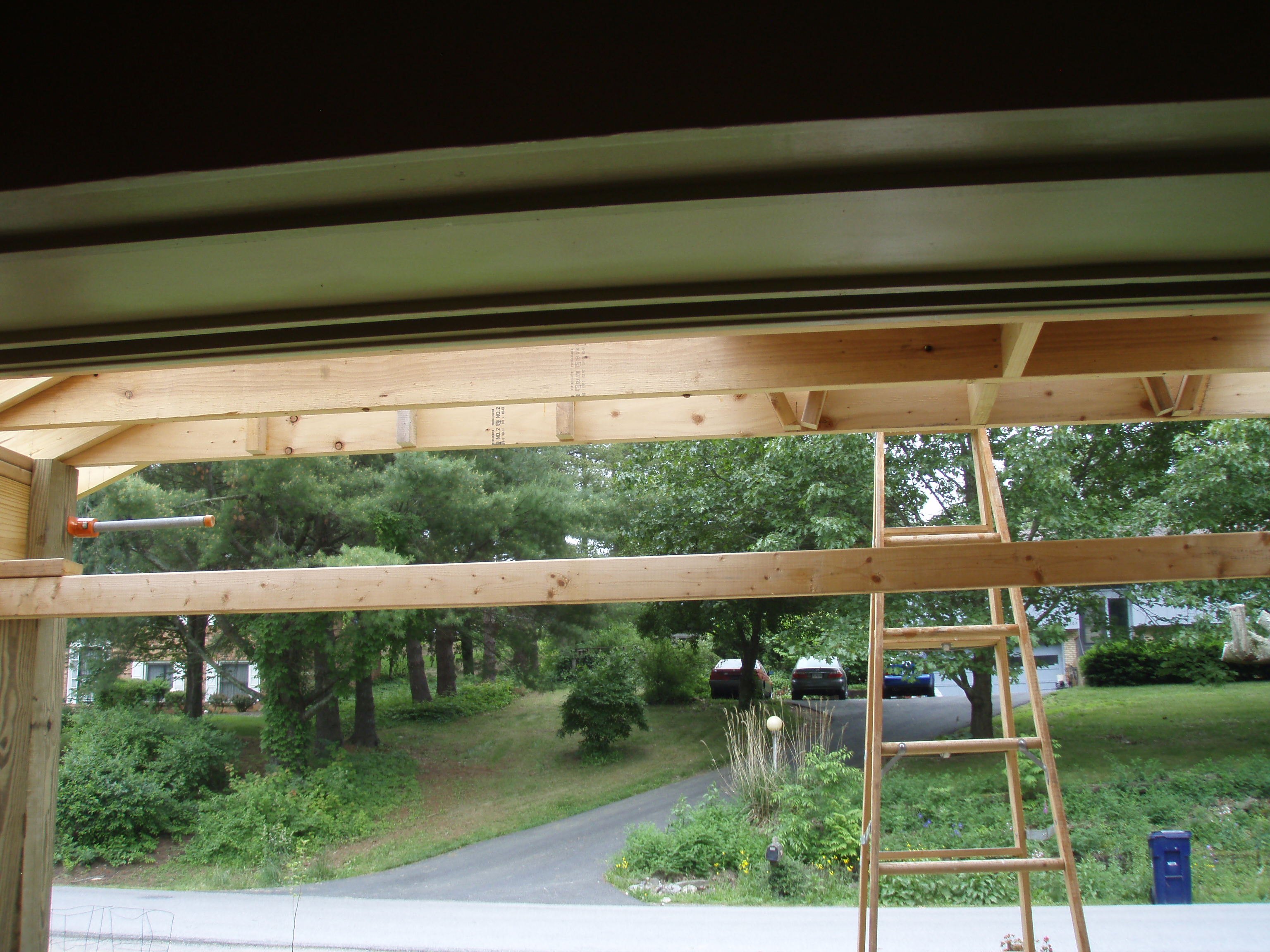 front gable porch with brick raised garden