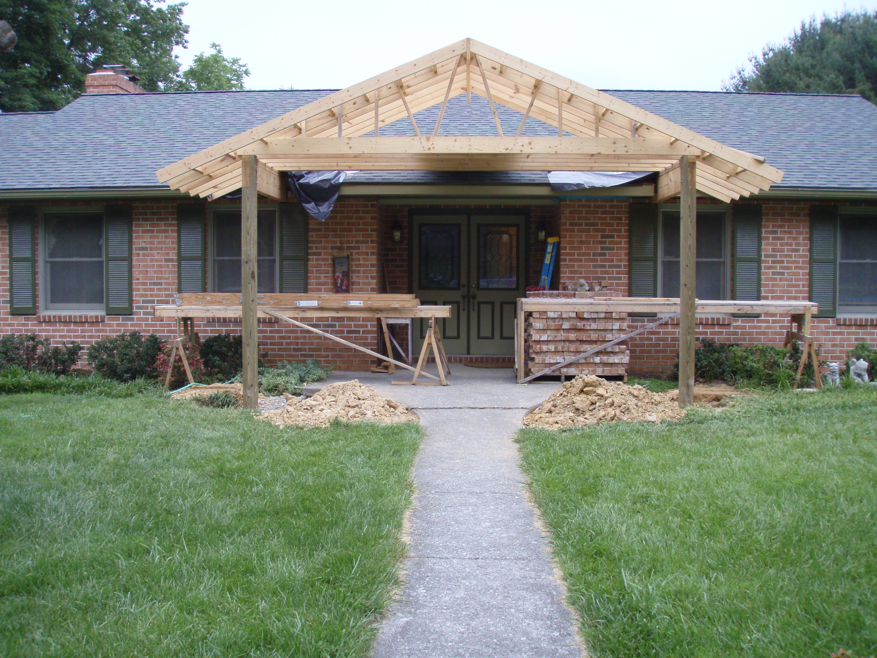 front gable porch with brick raised garden