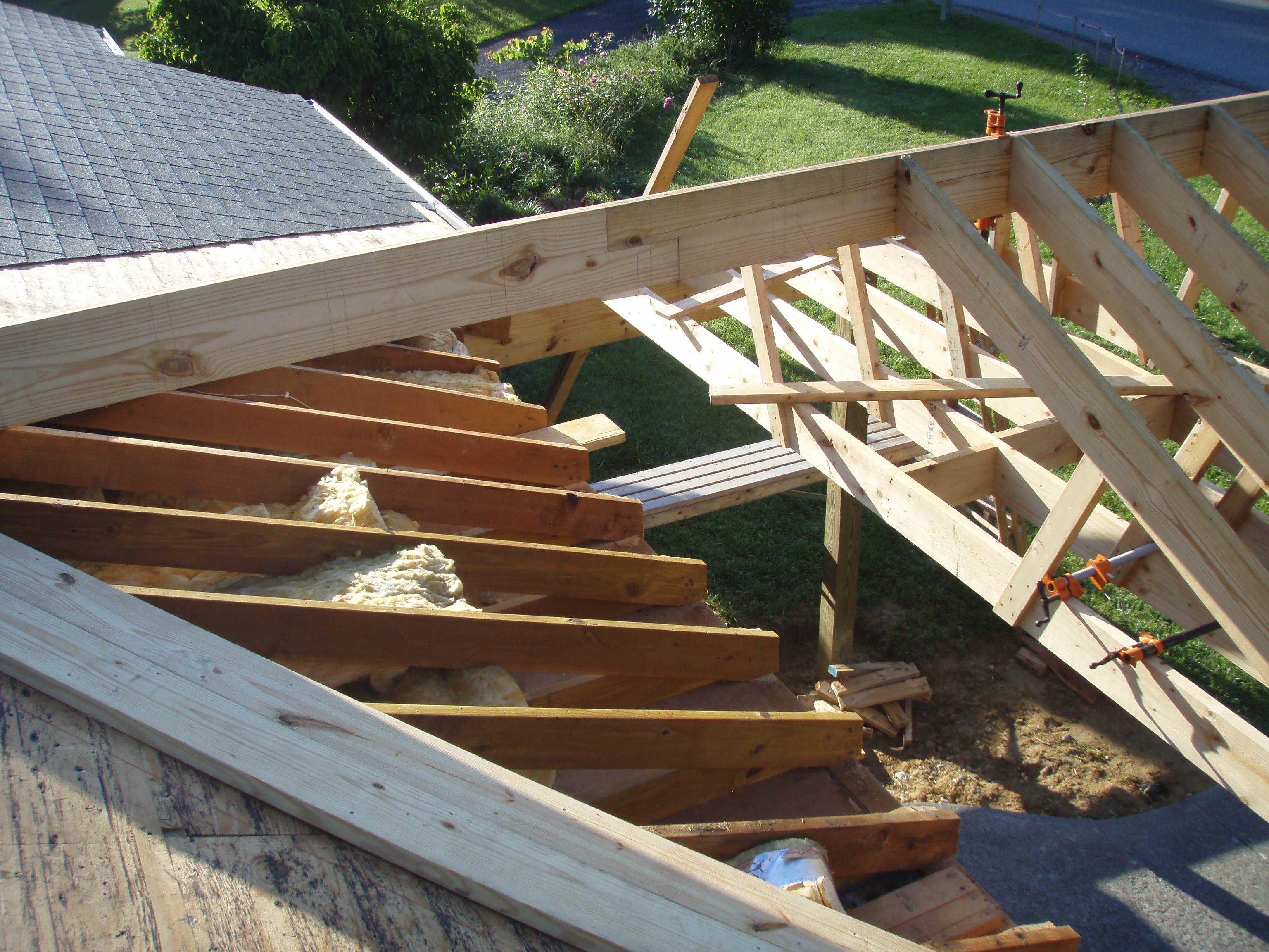 front gable porch with brick raised garden