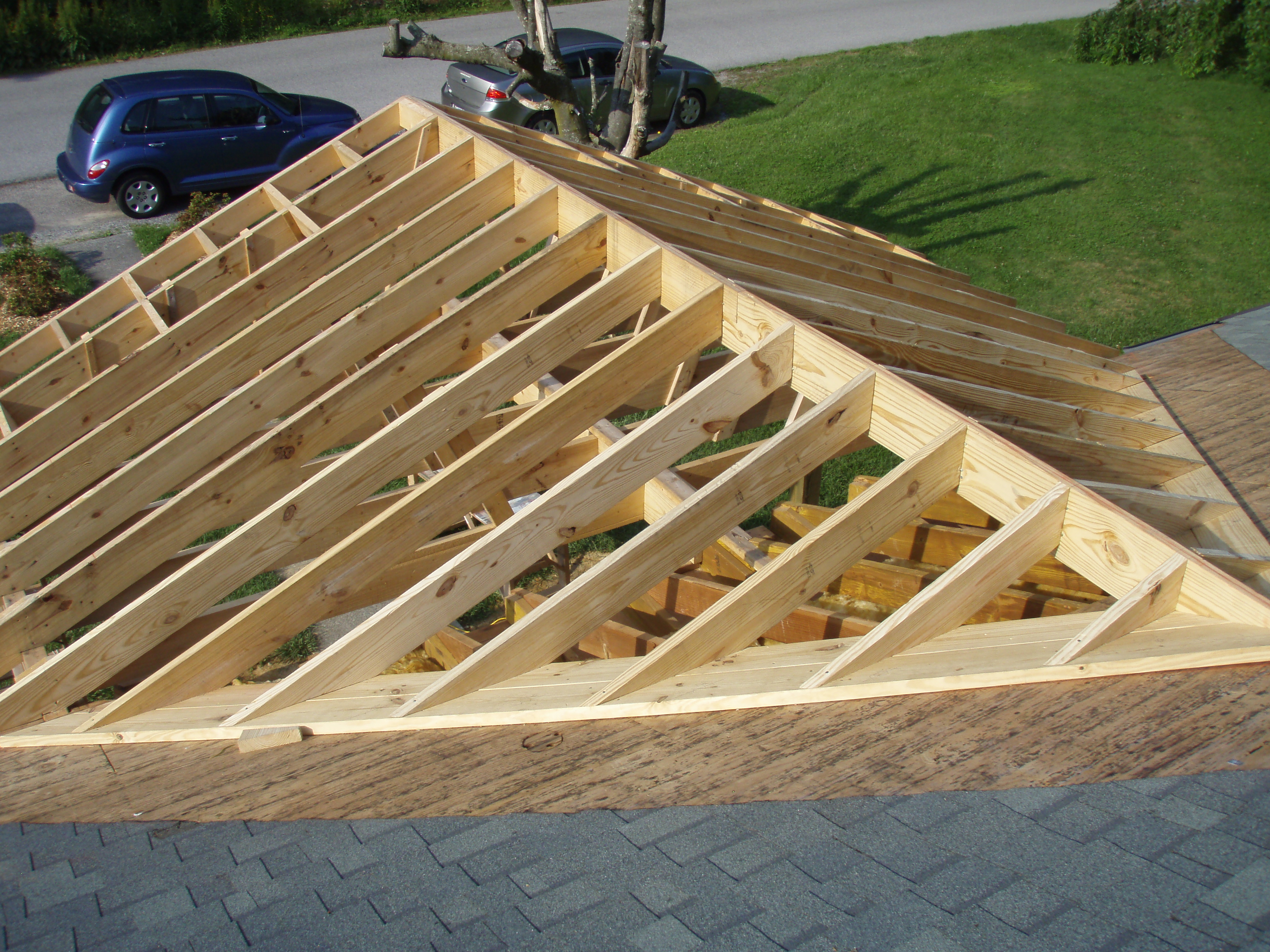 front gable porch with brick raised garden