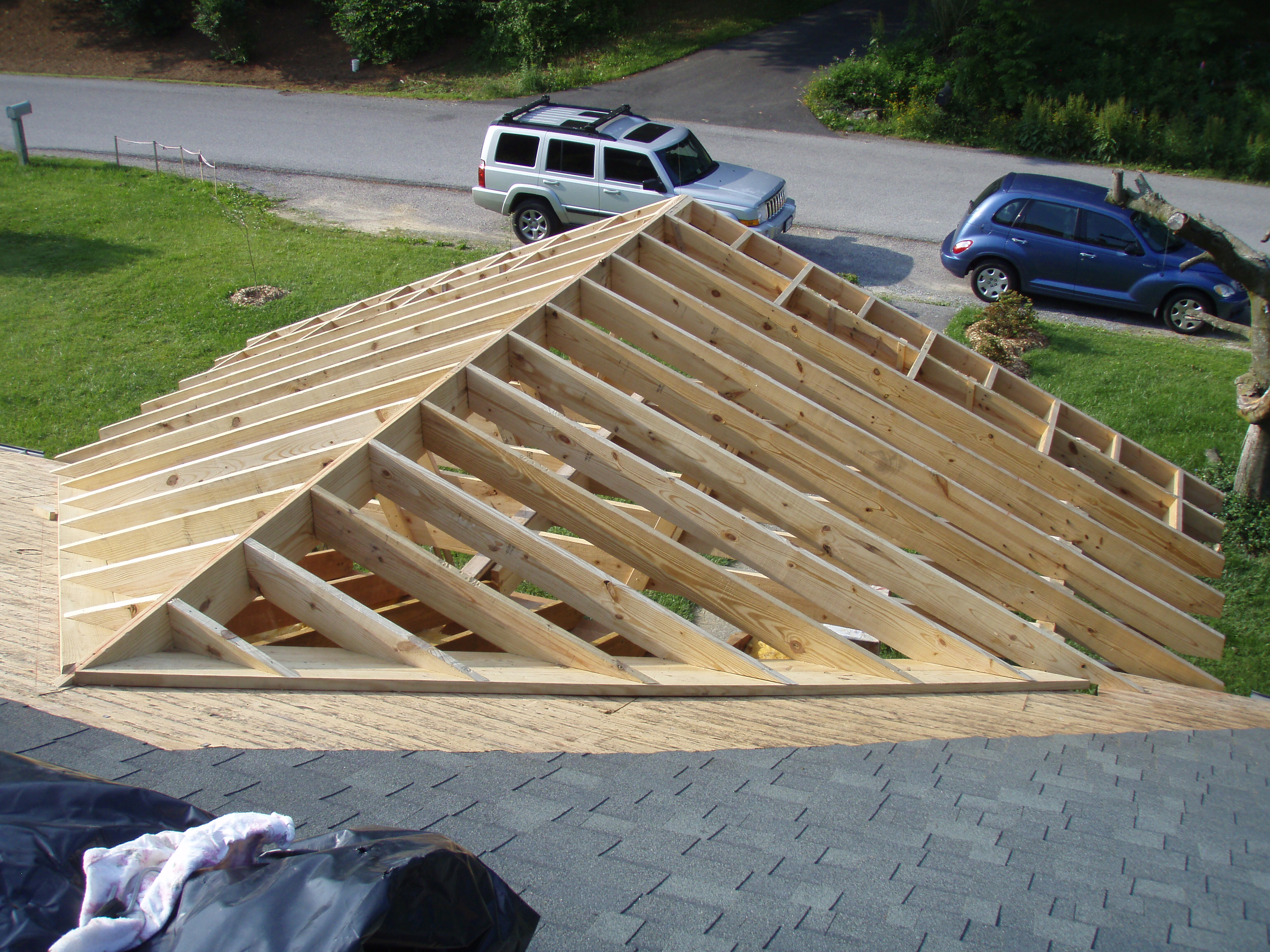 front gable porch with brick raised garden