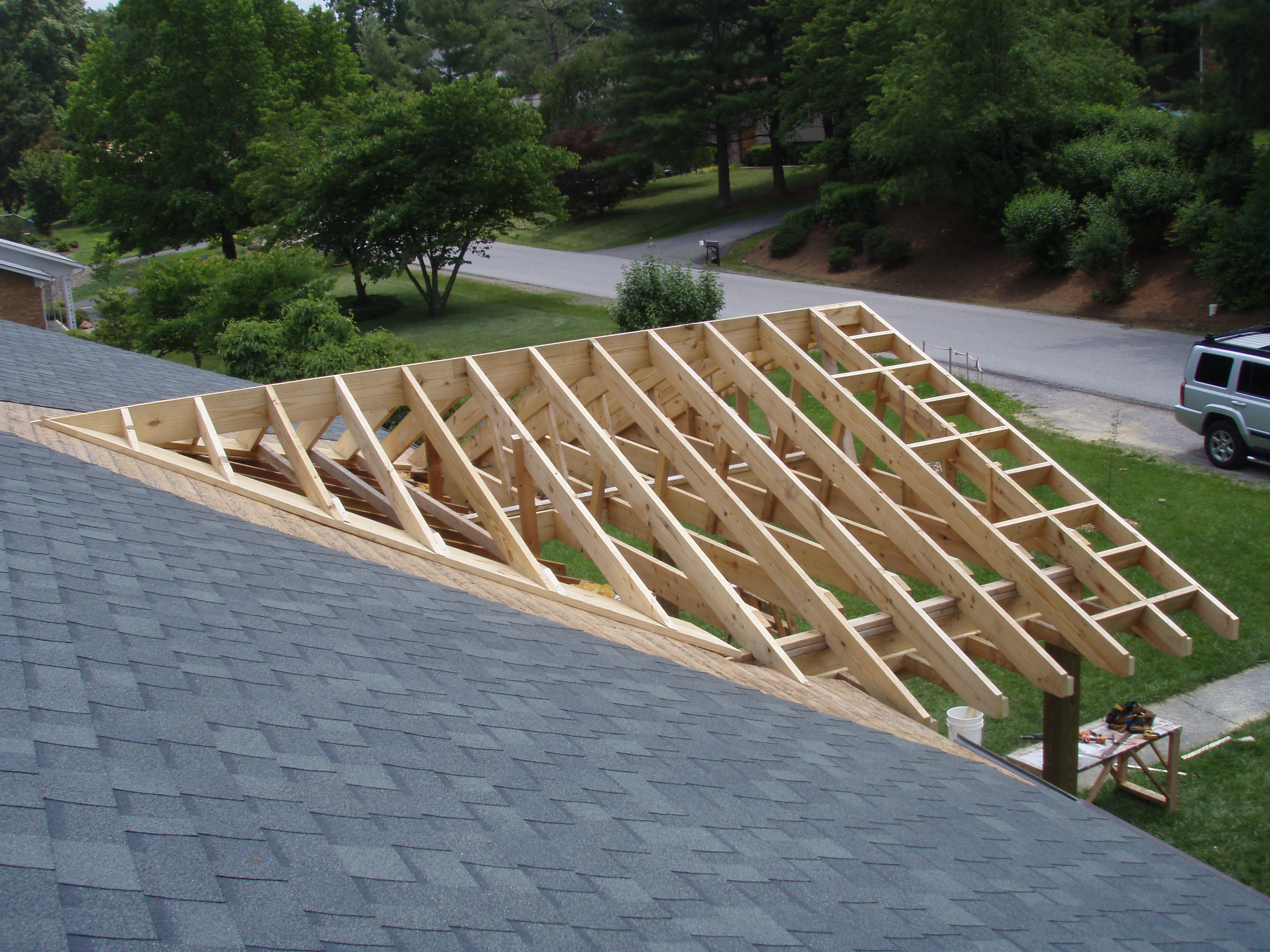 front gable porch with brick raised garden