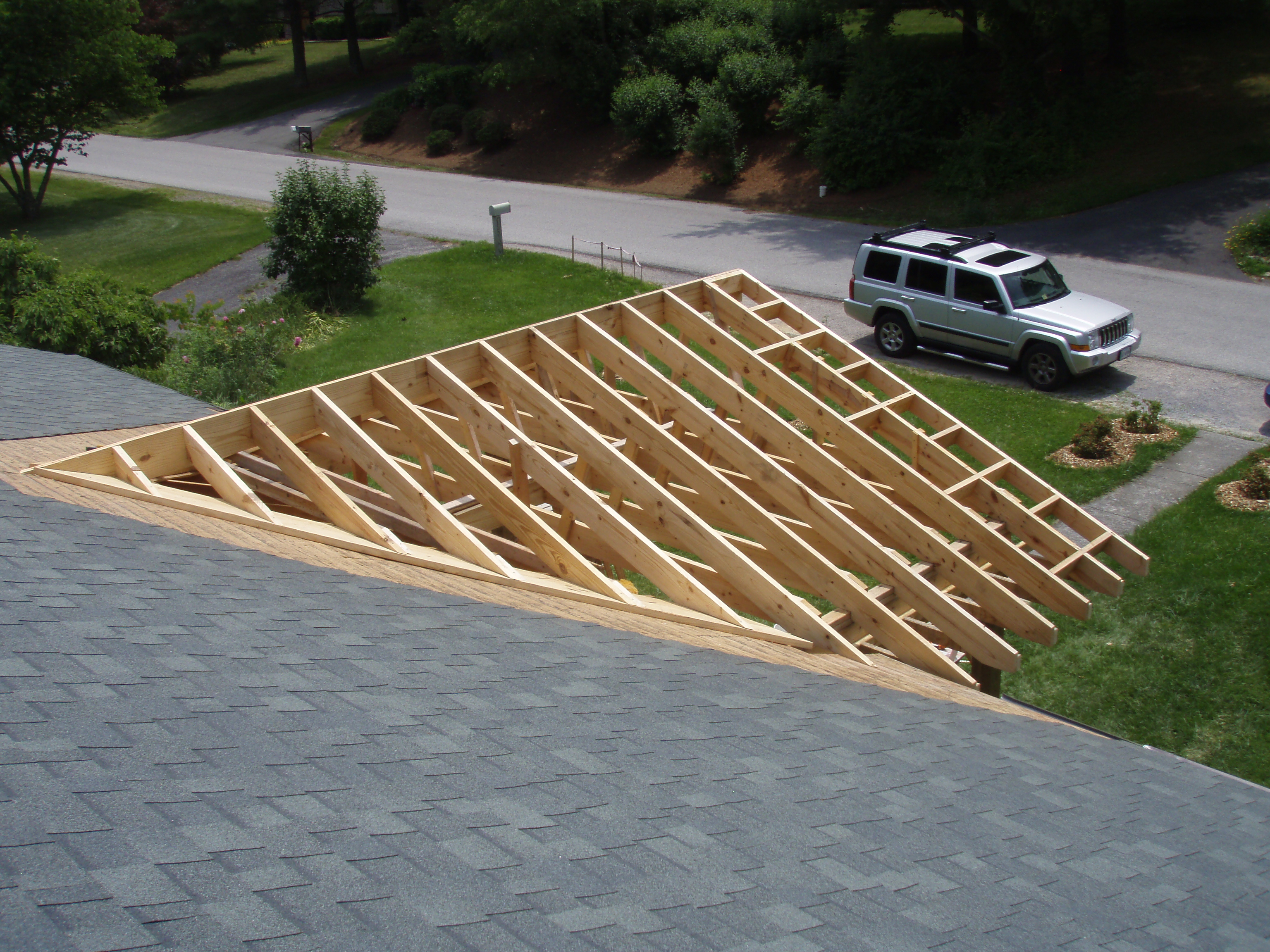 front gable porch with brick raised garden