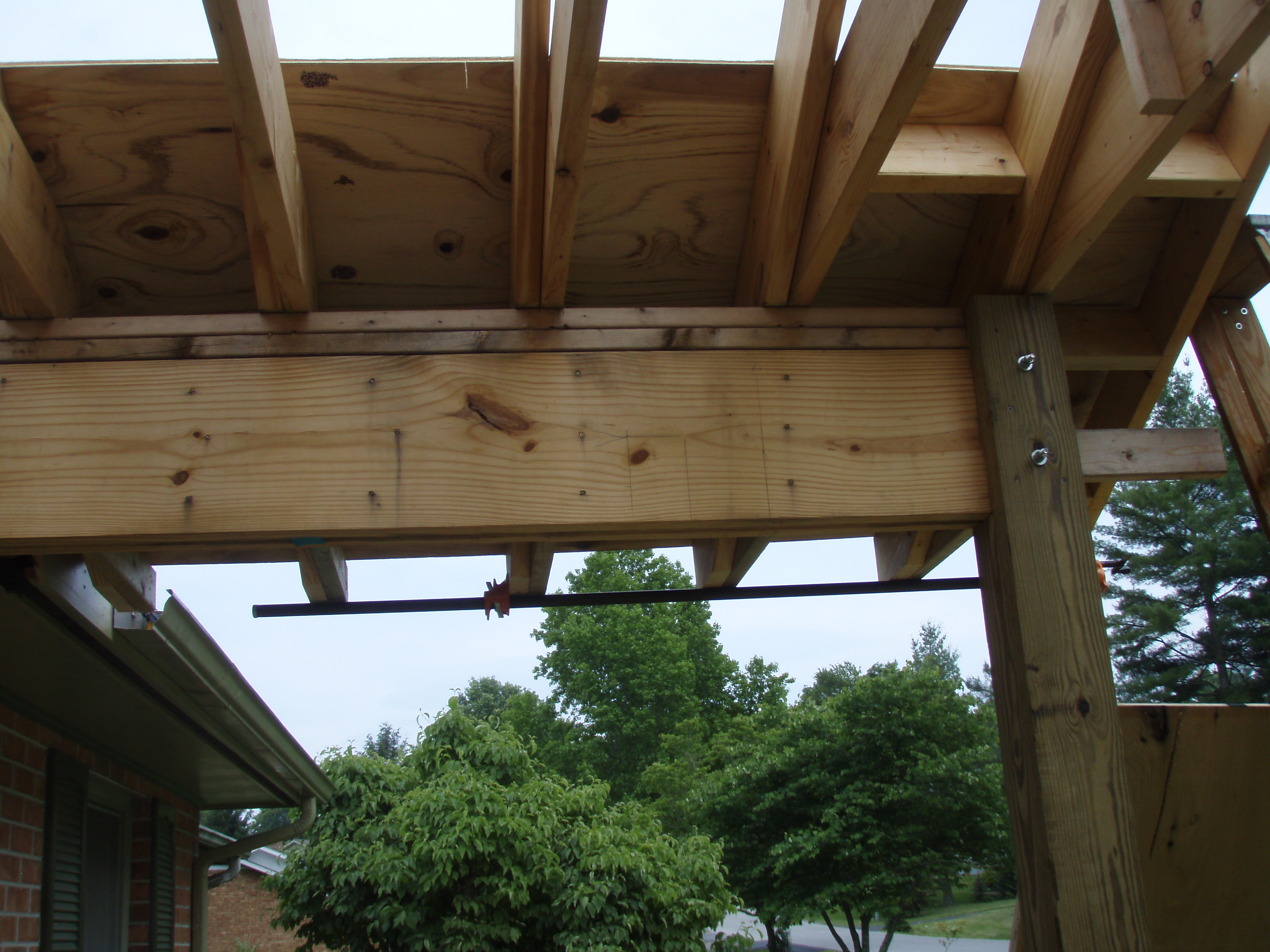 front gable porch with brick raised garden