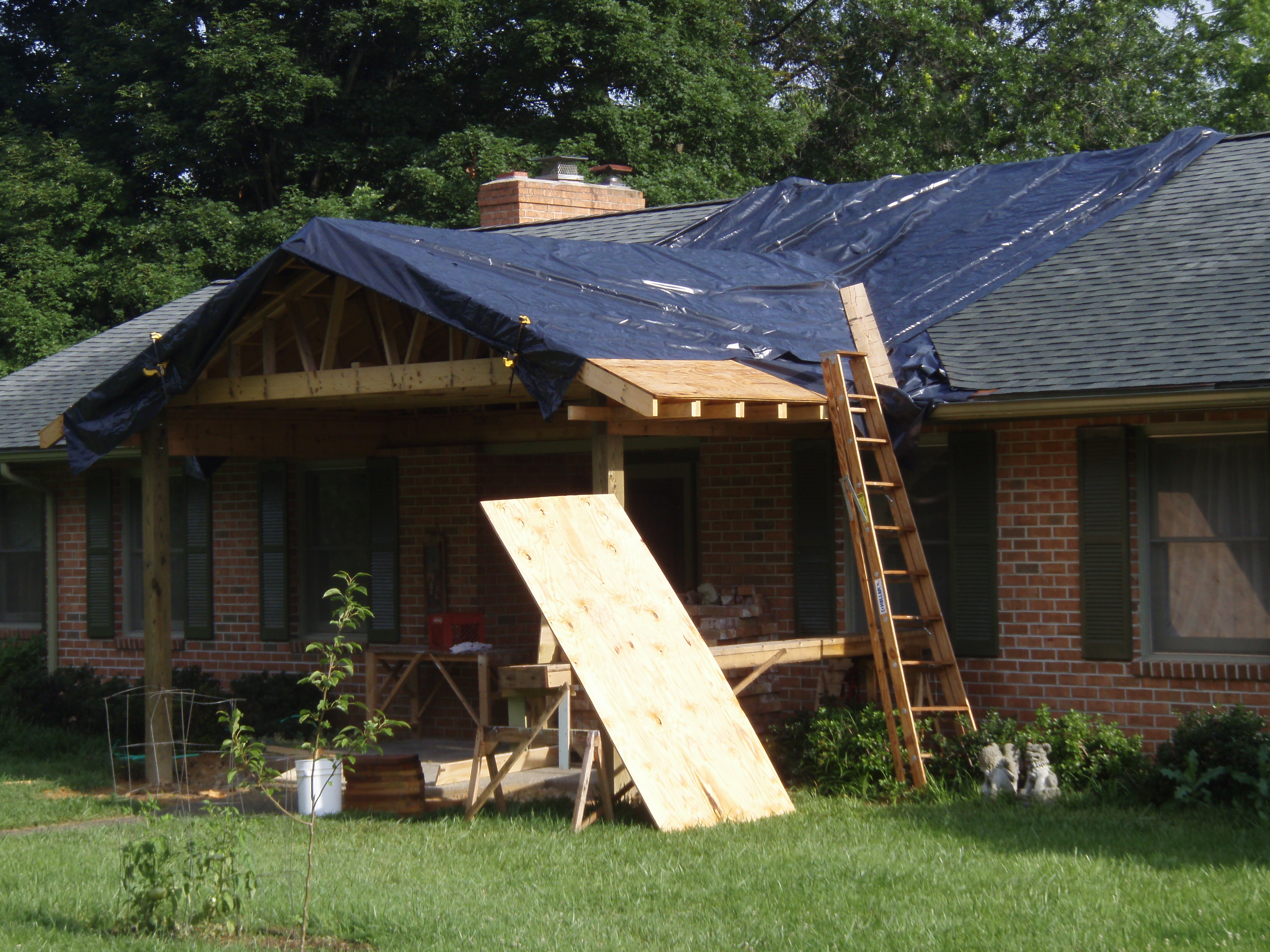 front gable porch with brick raised garden