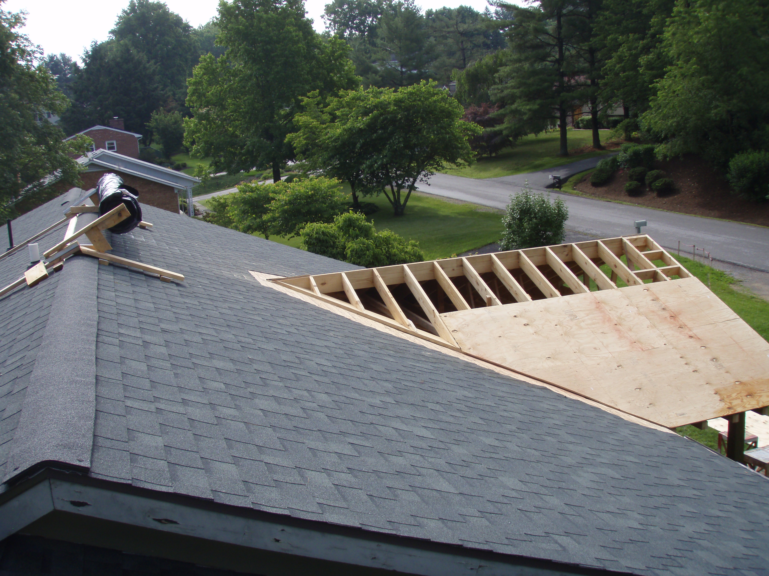 front gable porch with brick raised garden