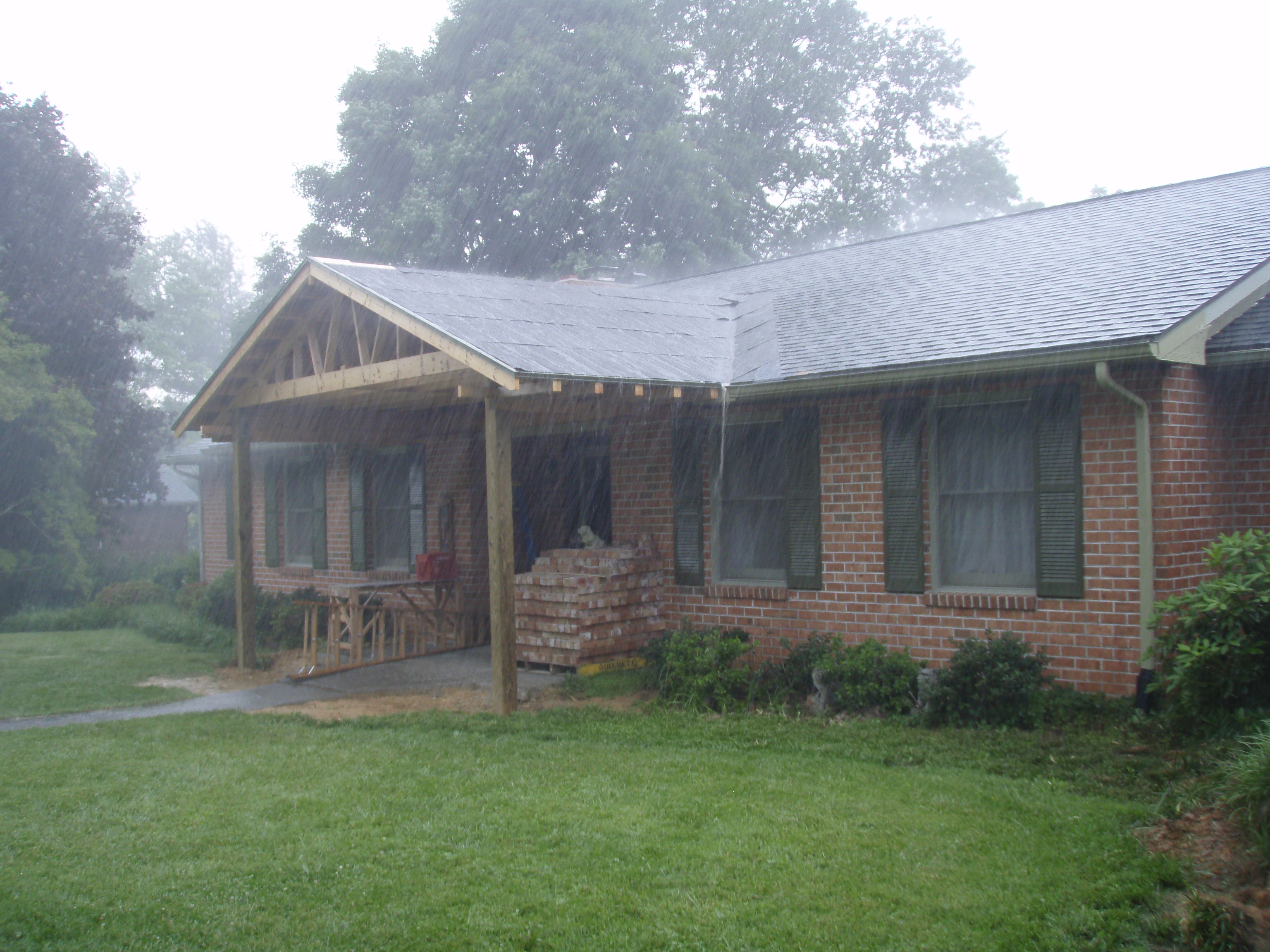 front gable porch with brick raised garden