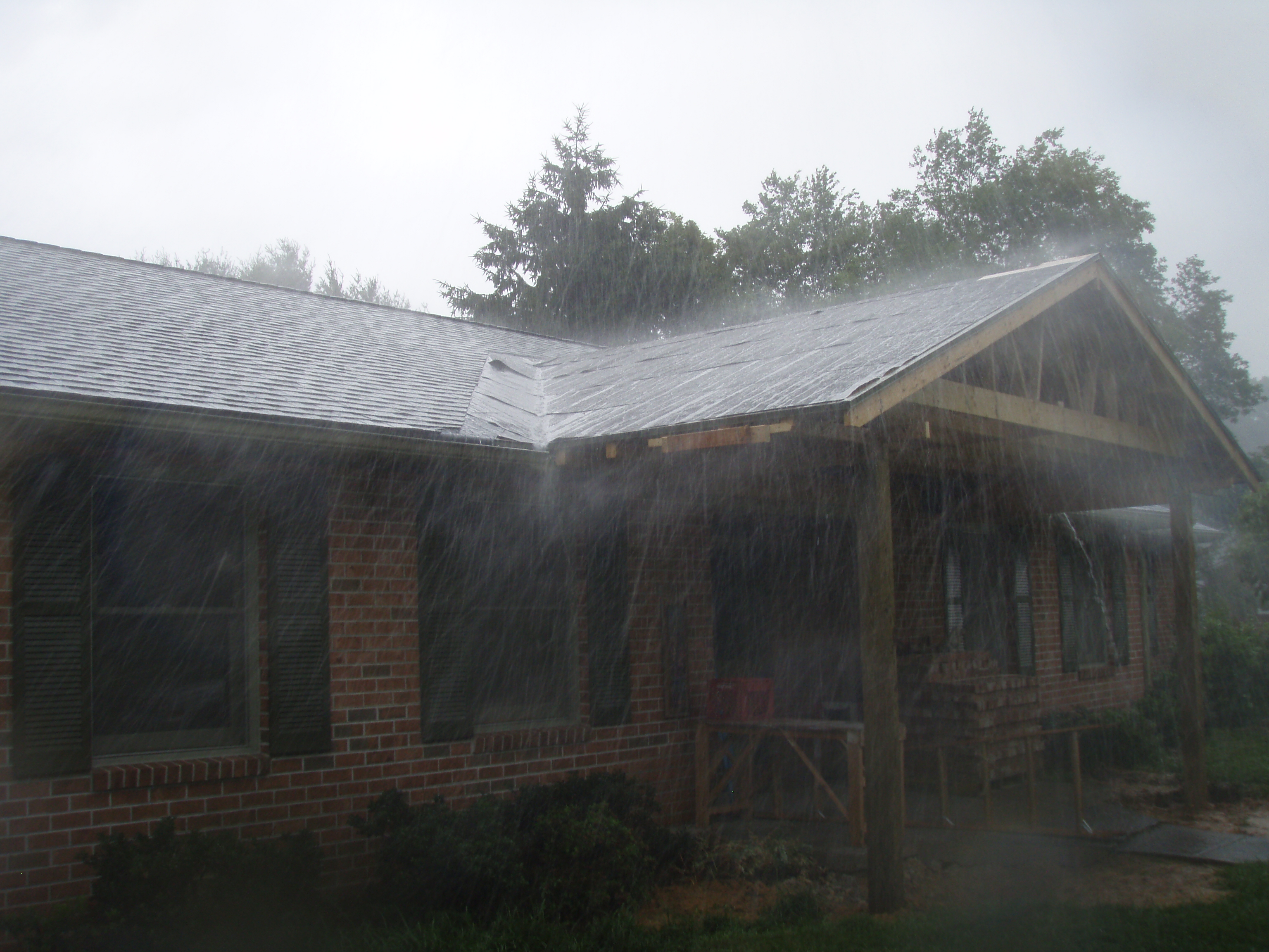 front gable porch with brick raised garden