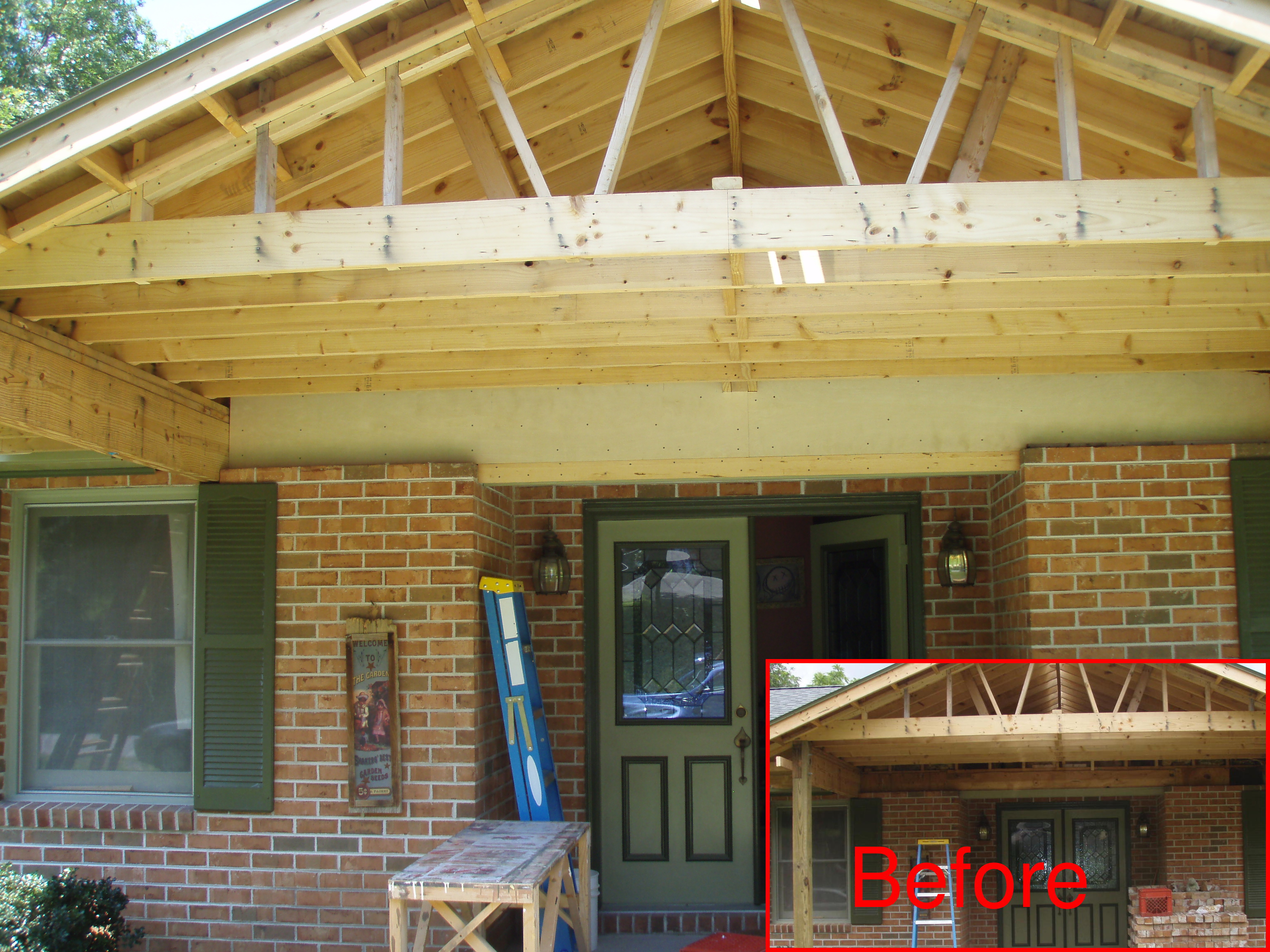 front gable porch with brick raised garden