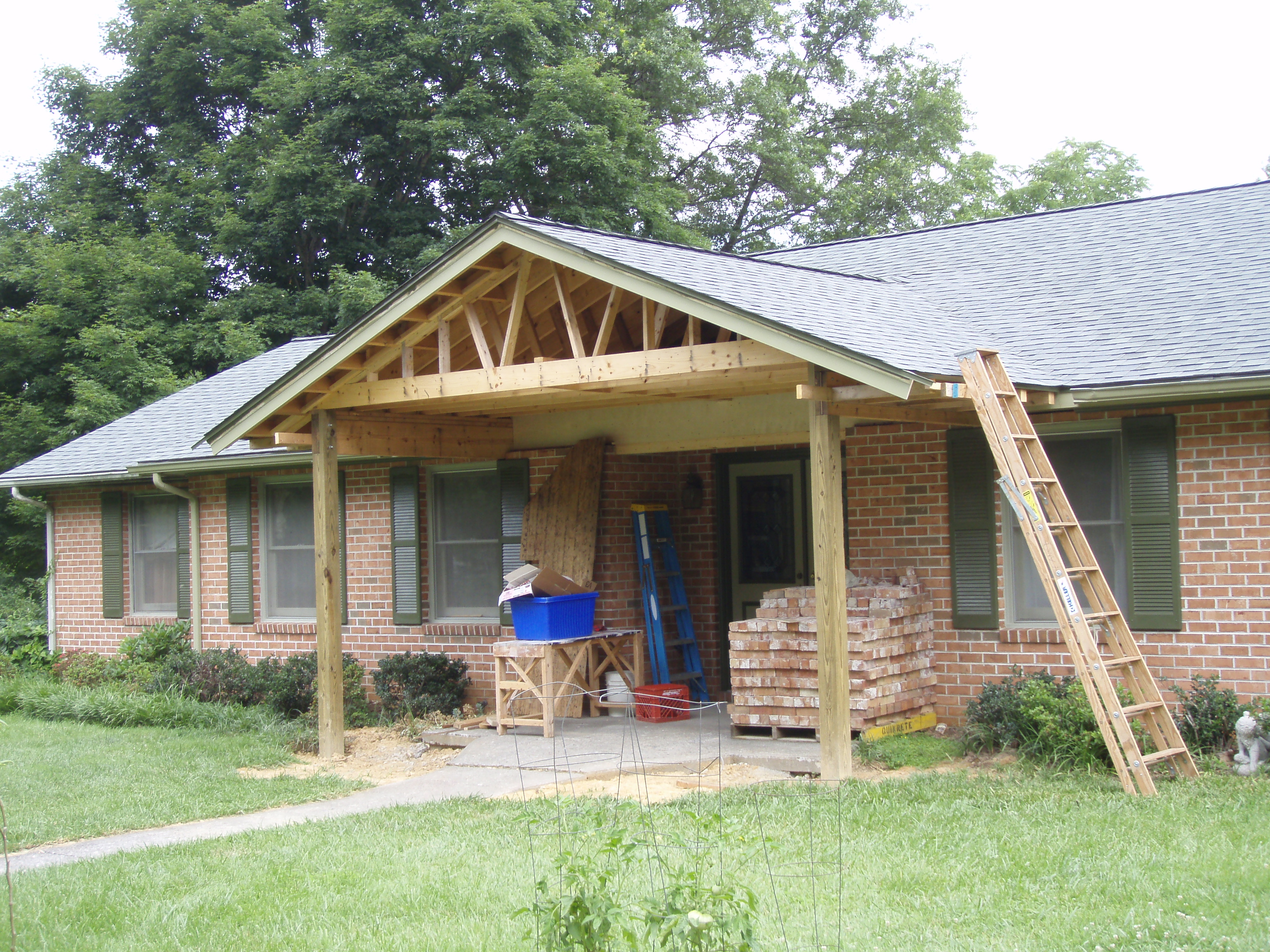 front gable porch with brick raised garden