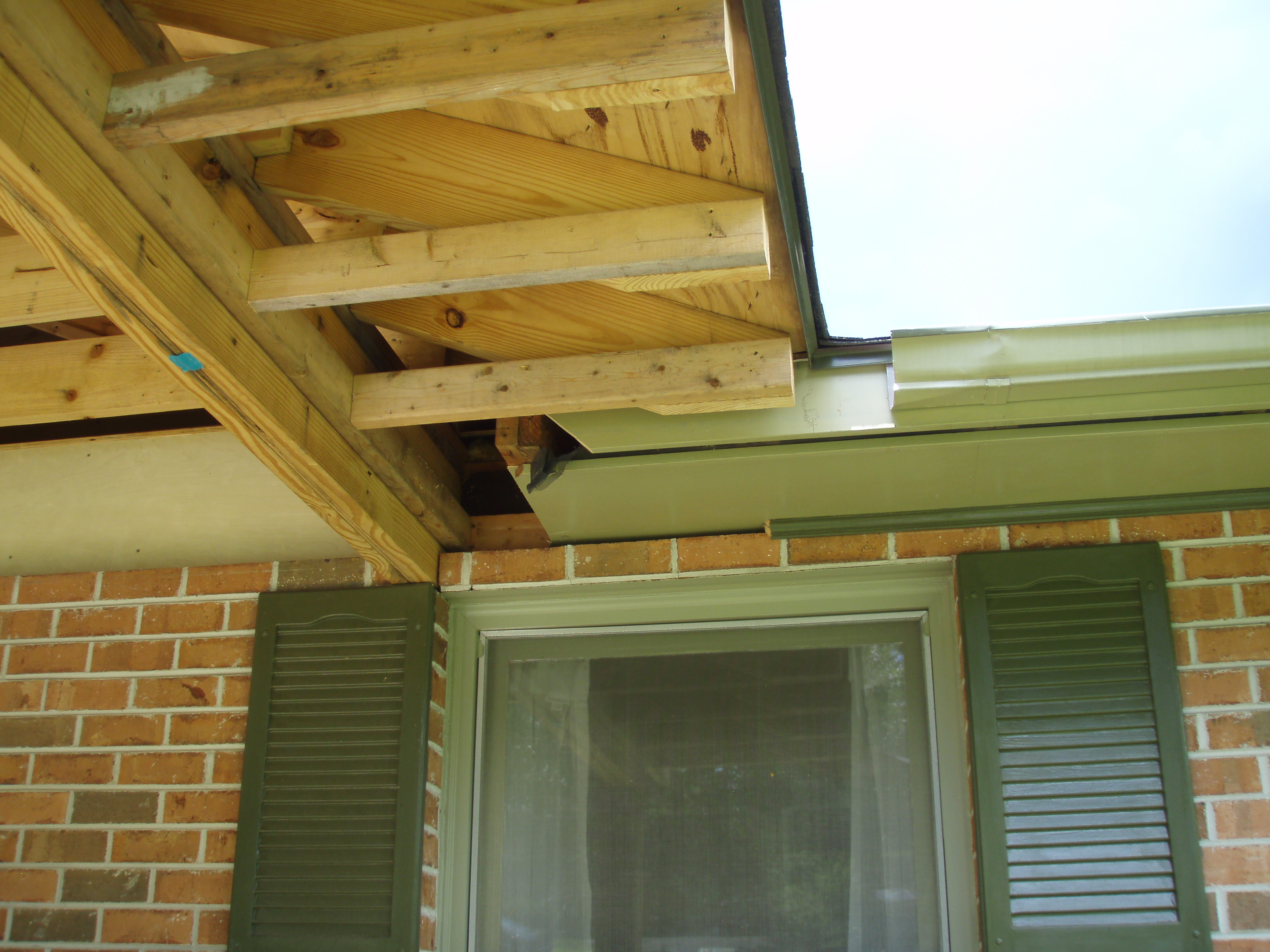 front gable porch with brick raised garden