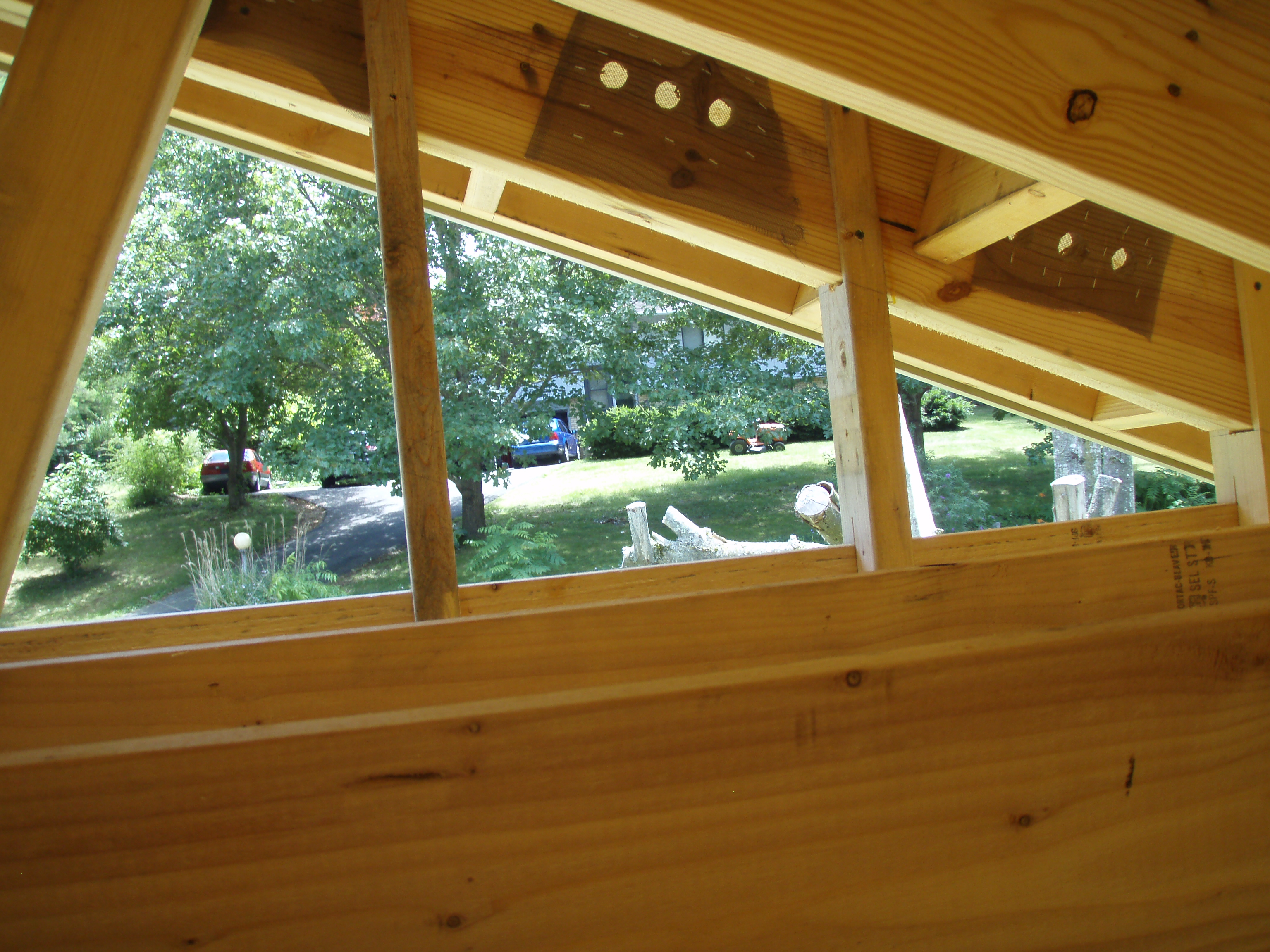 front gable porch with brick raised garden