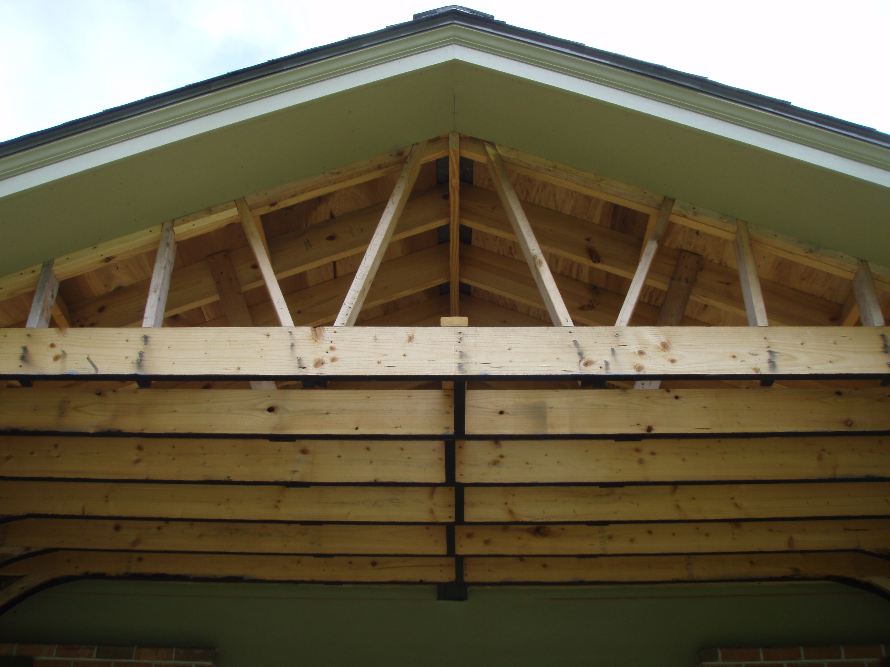 front gable porch with brick raised garden