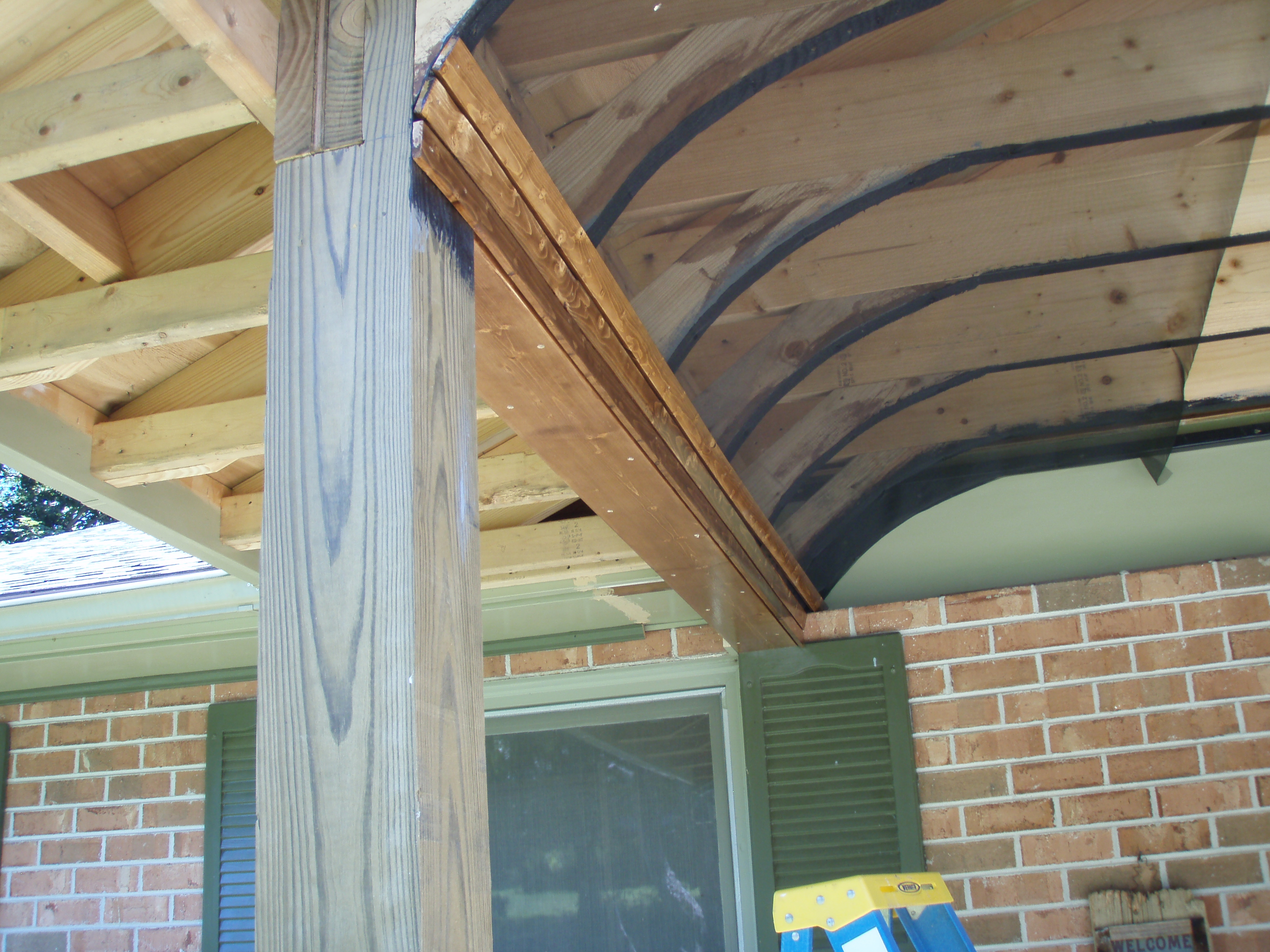 front gable porch with brick raised garden