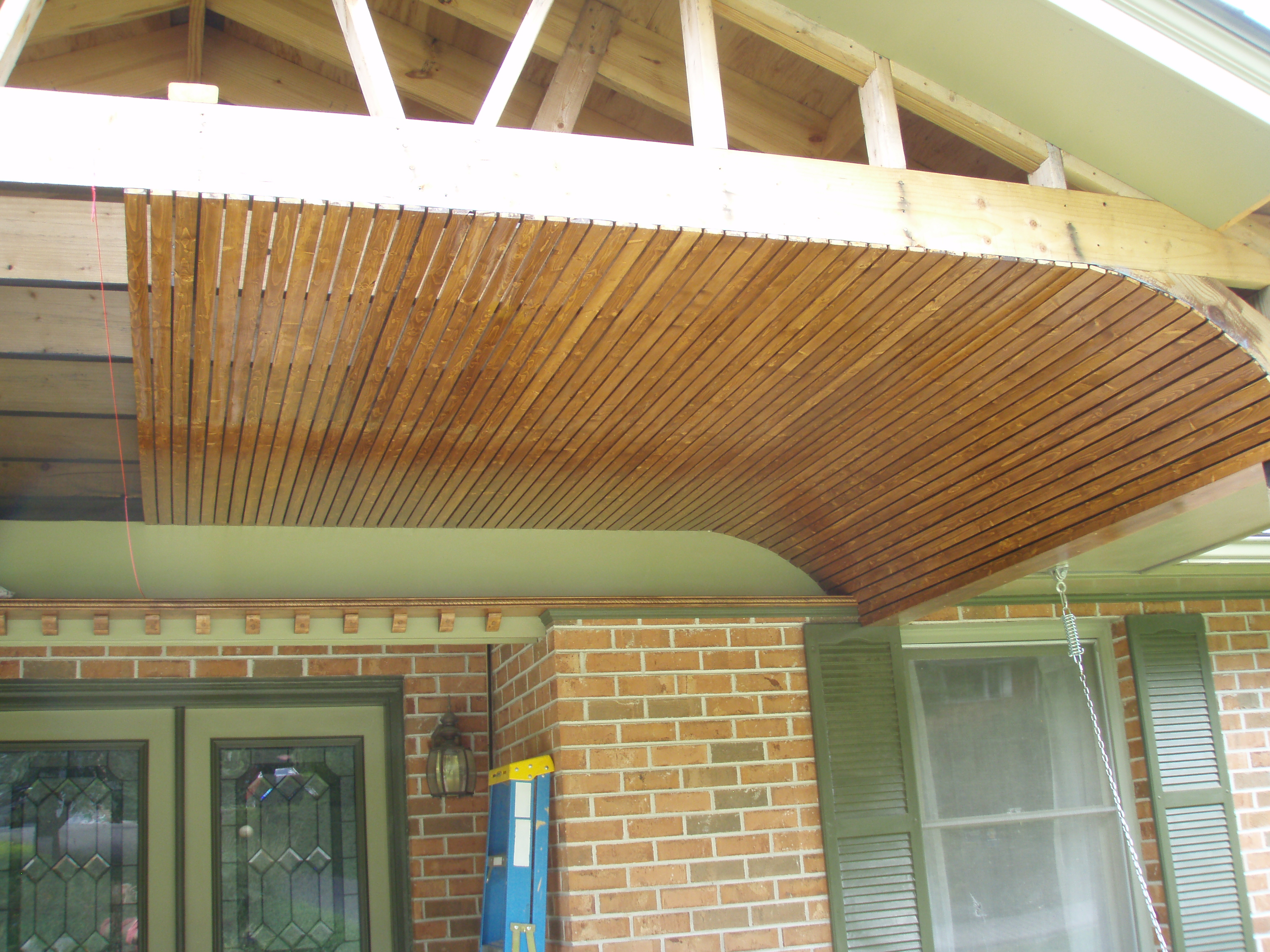 front gable porch with brick raised garden