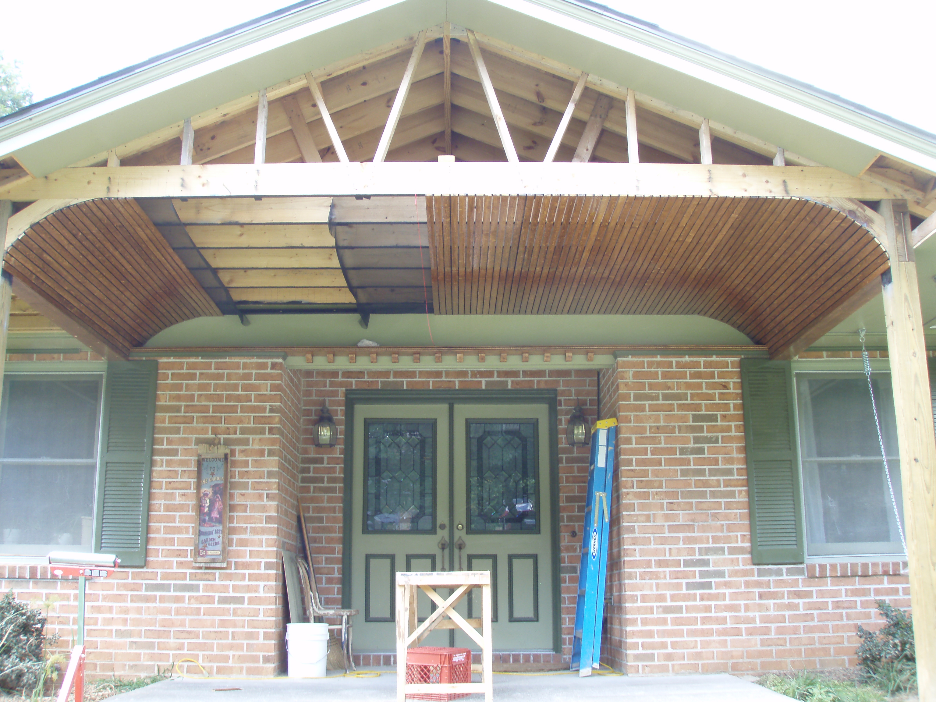 front gable porch with brick raised garden