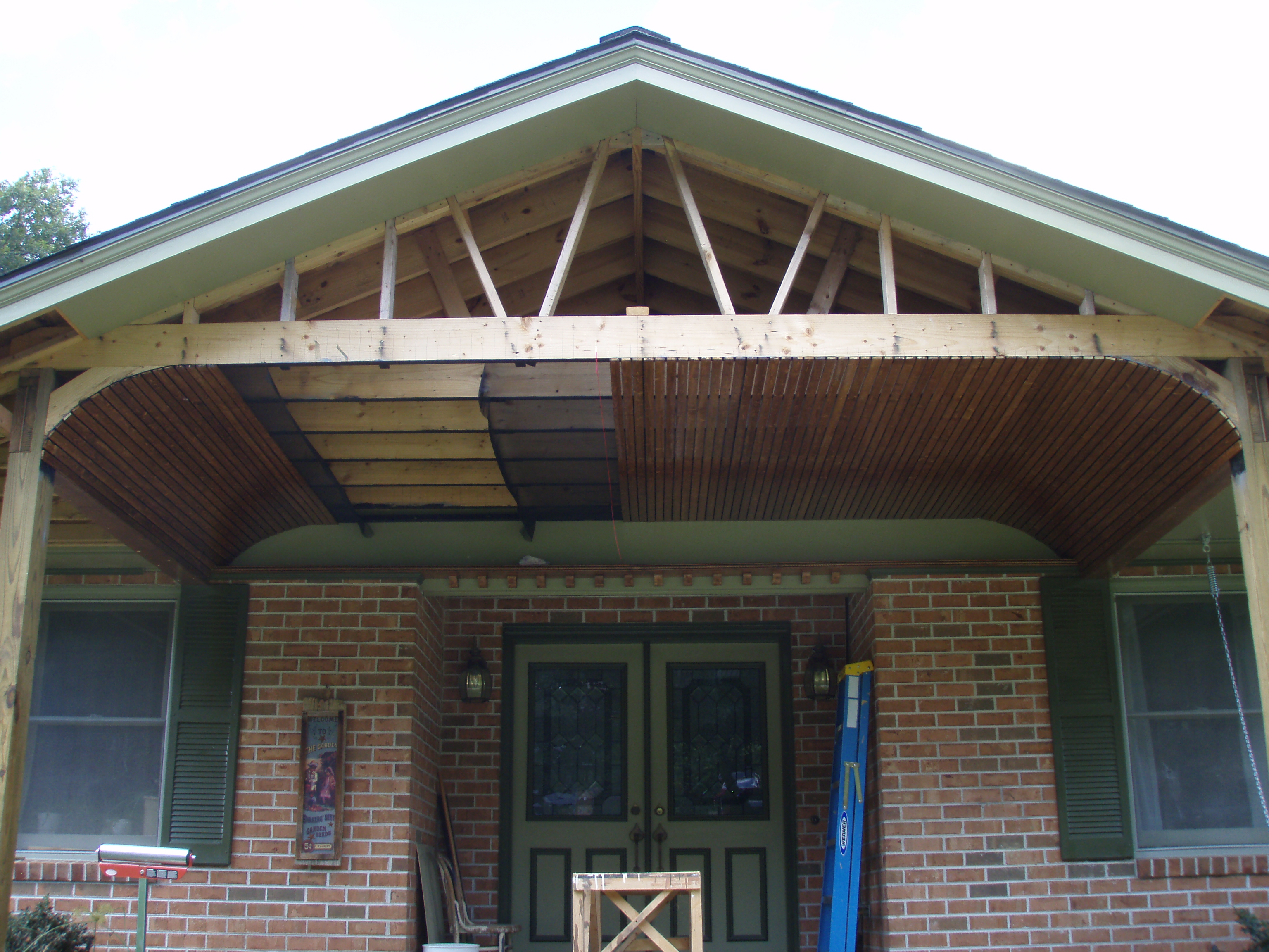 front gable porch with brick raised garden