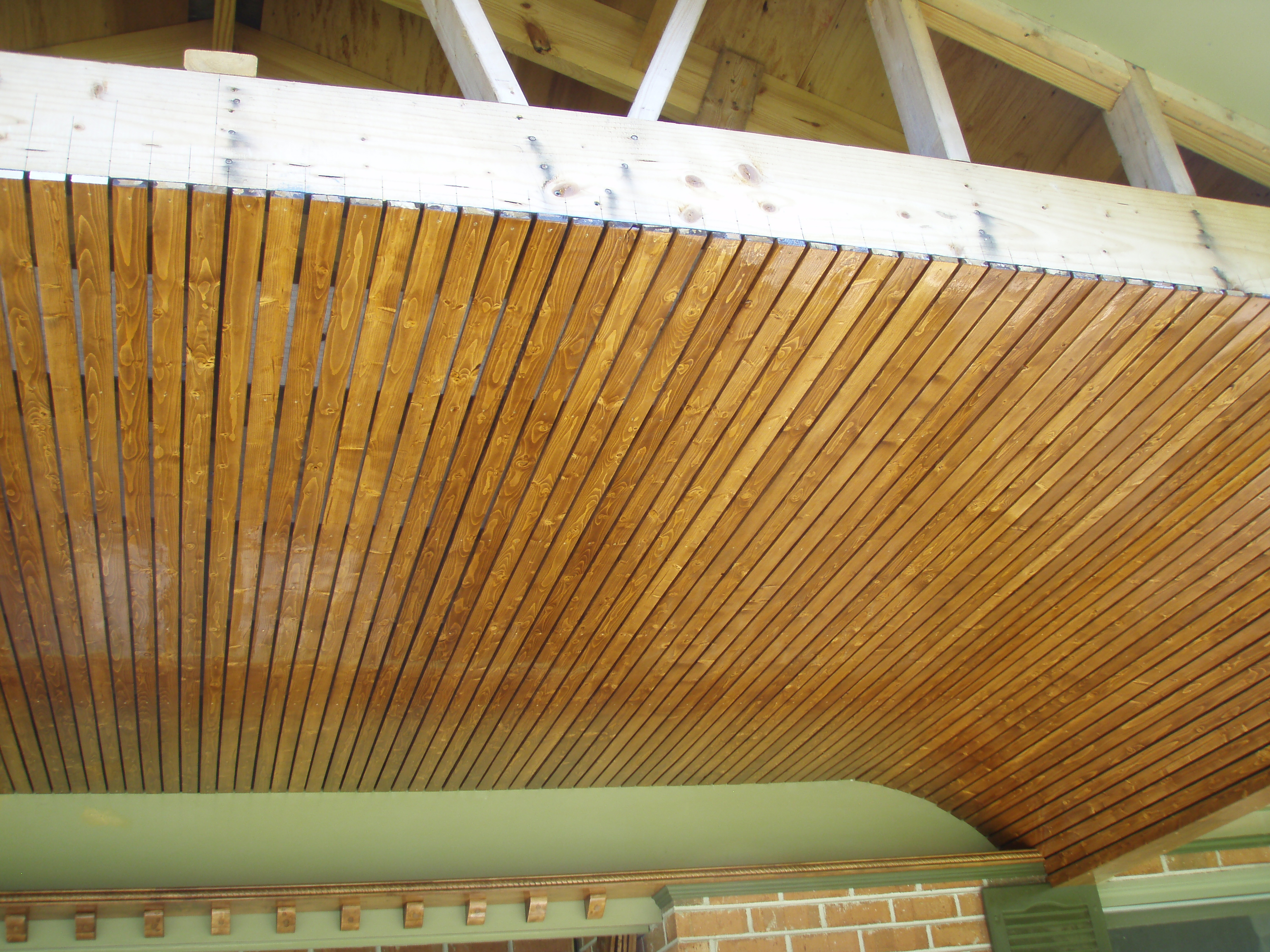 front gable porch with brick raised garden