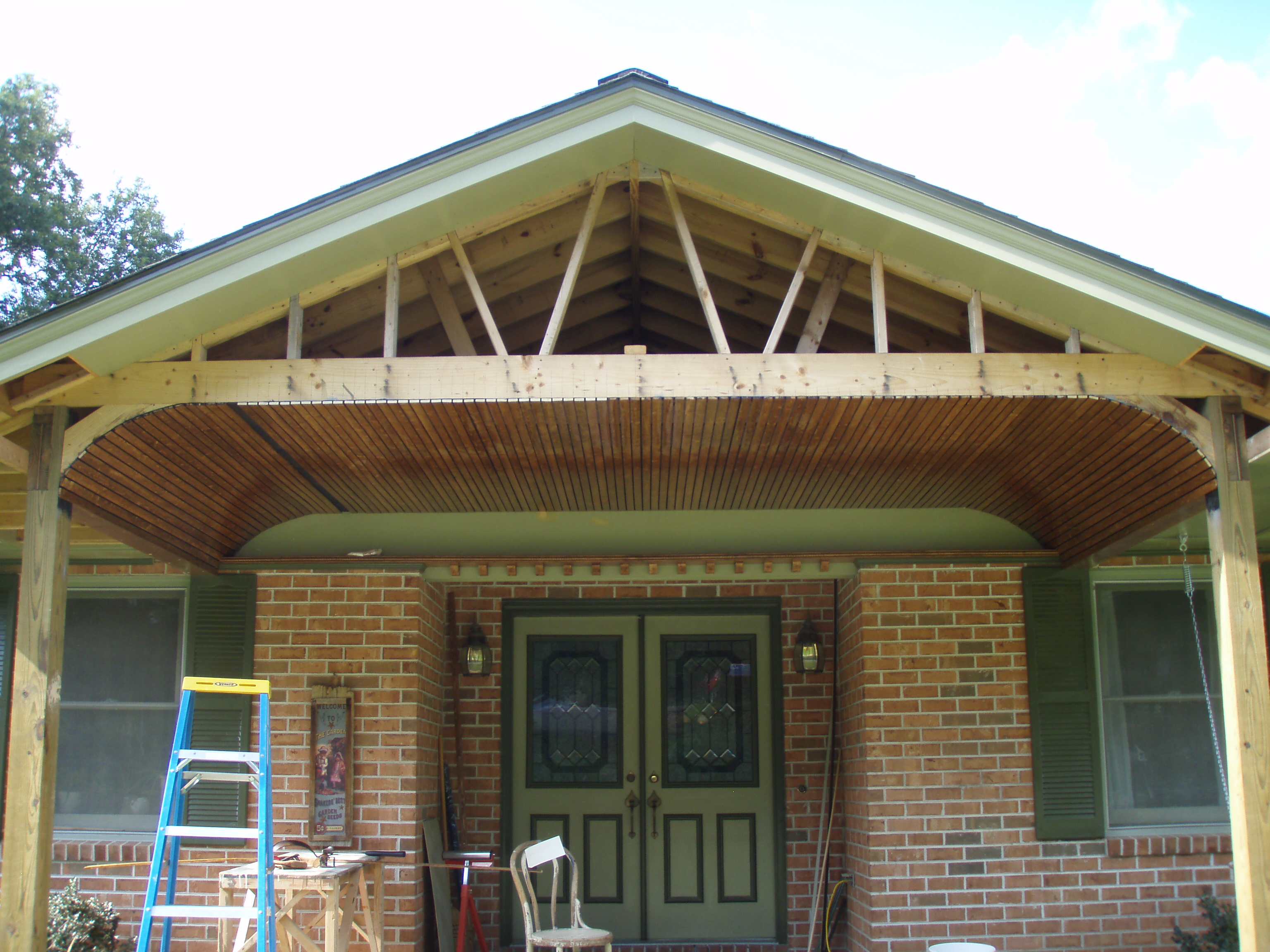 front gable porch with brick raised garden