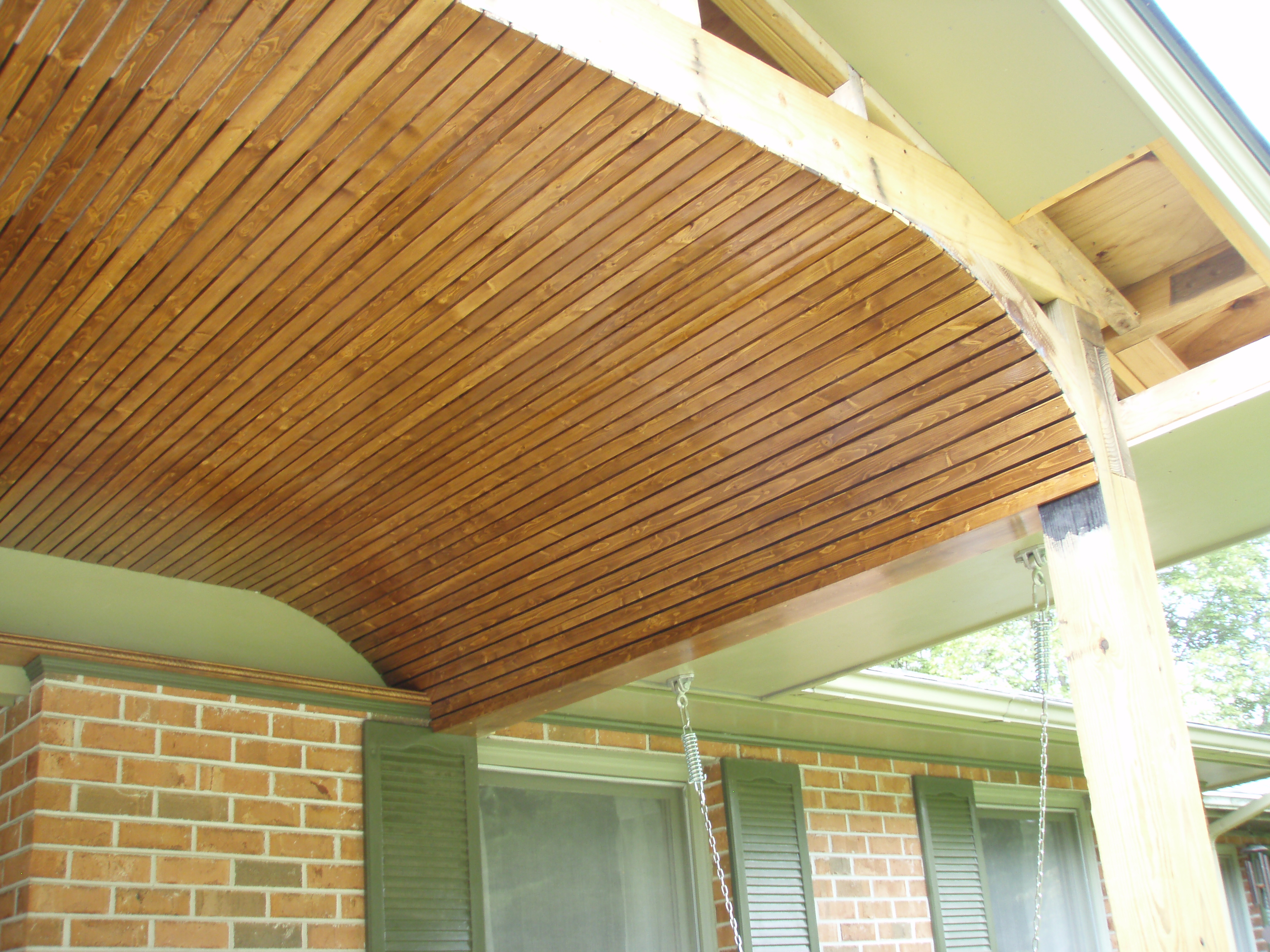 front gable porch with brick raised garden