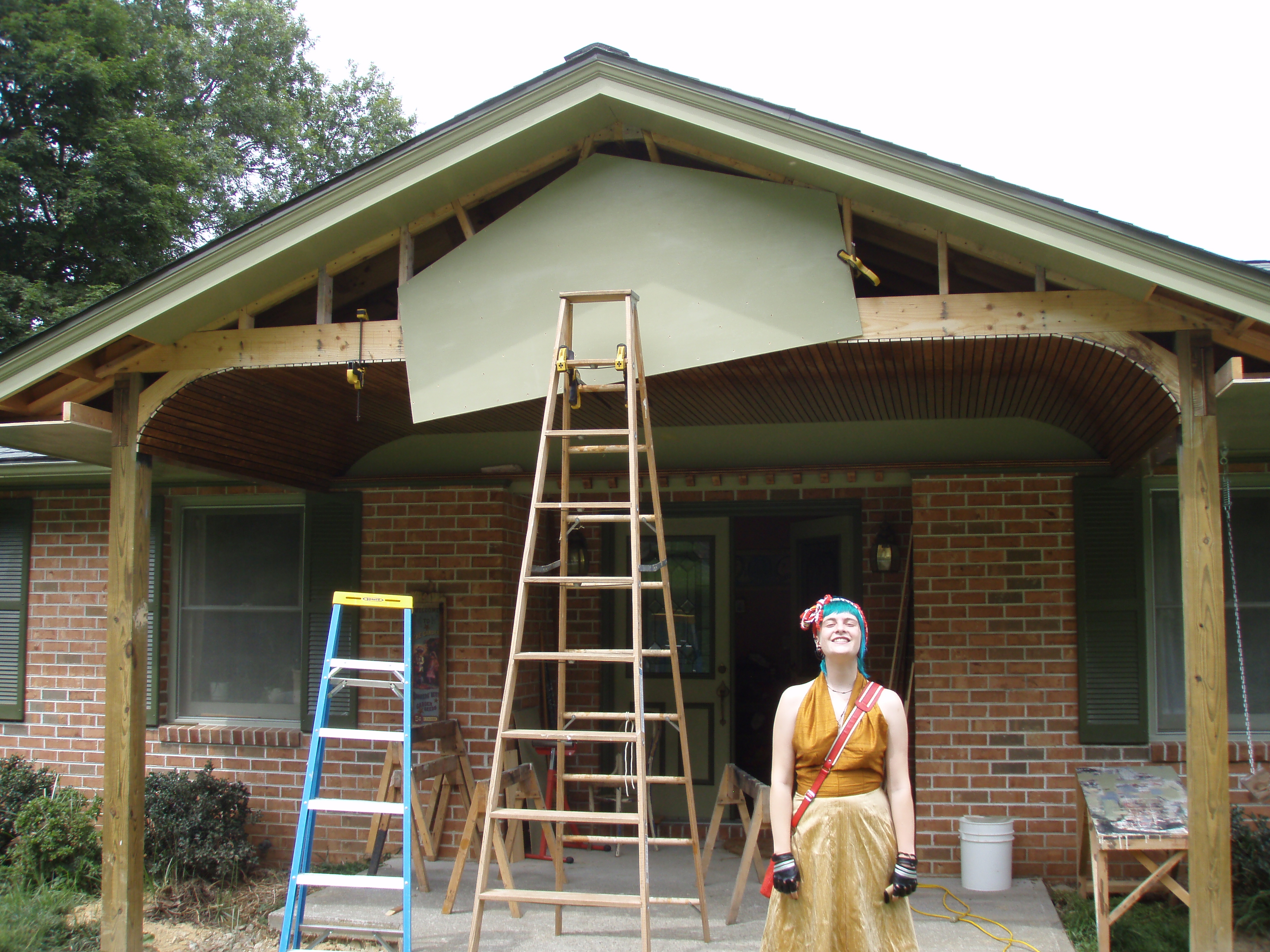 front gable porch with brick raised garden