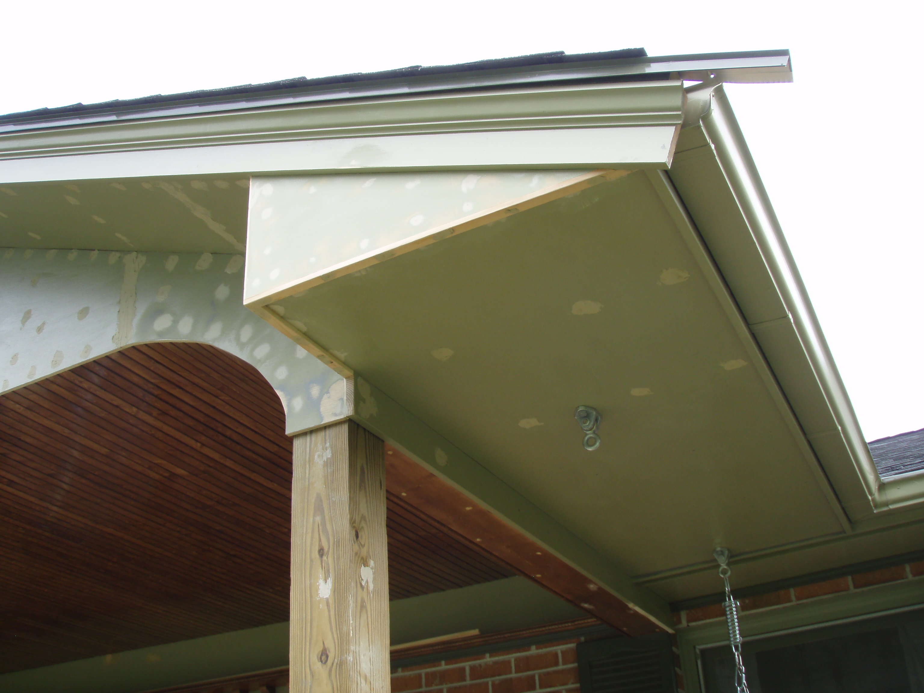 front gable porch with brick raised garden