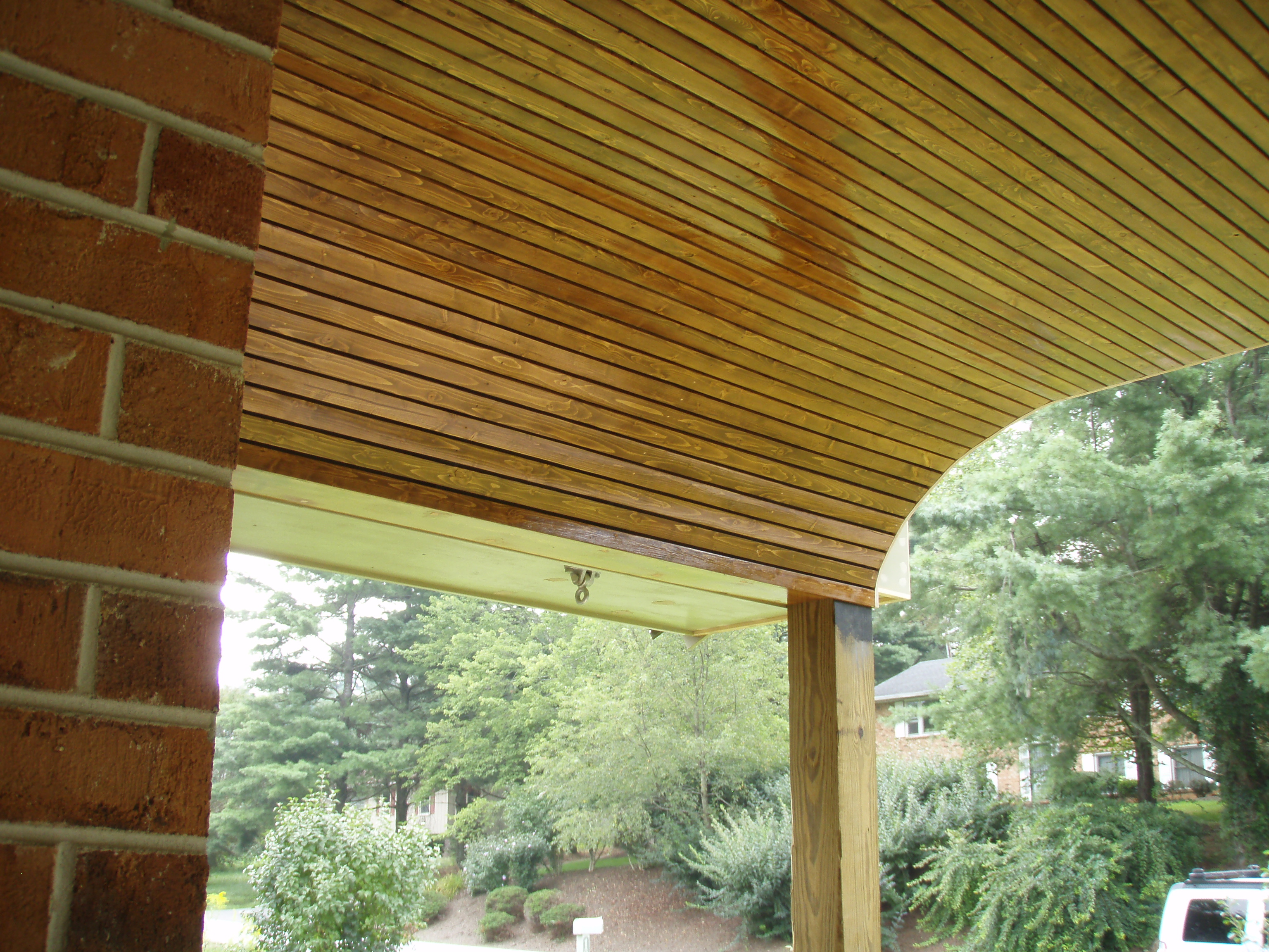 front gable porch with brick raised garden