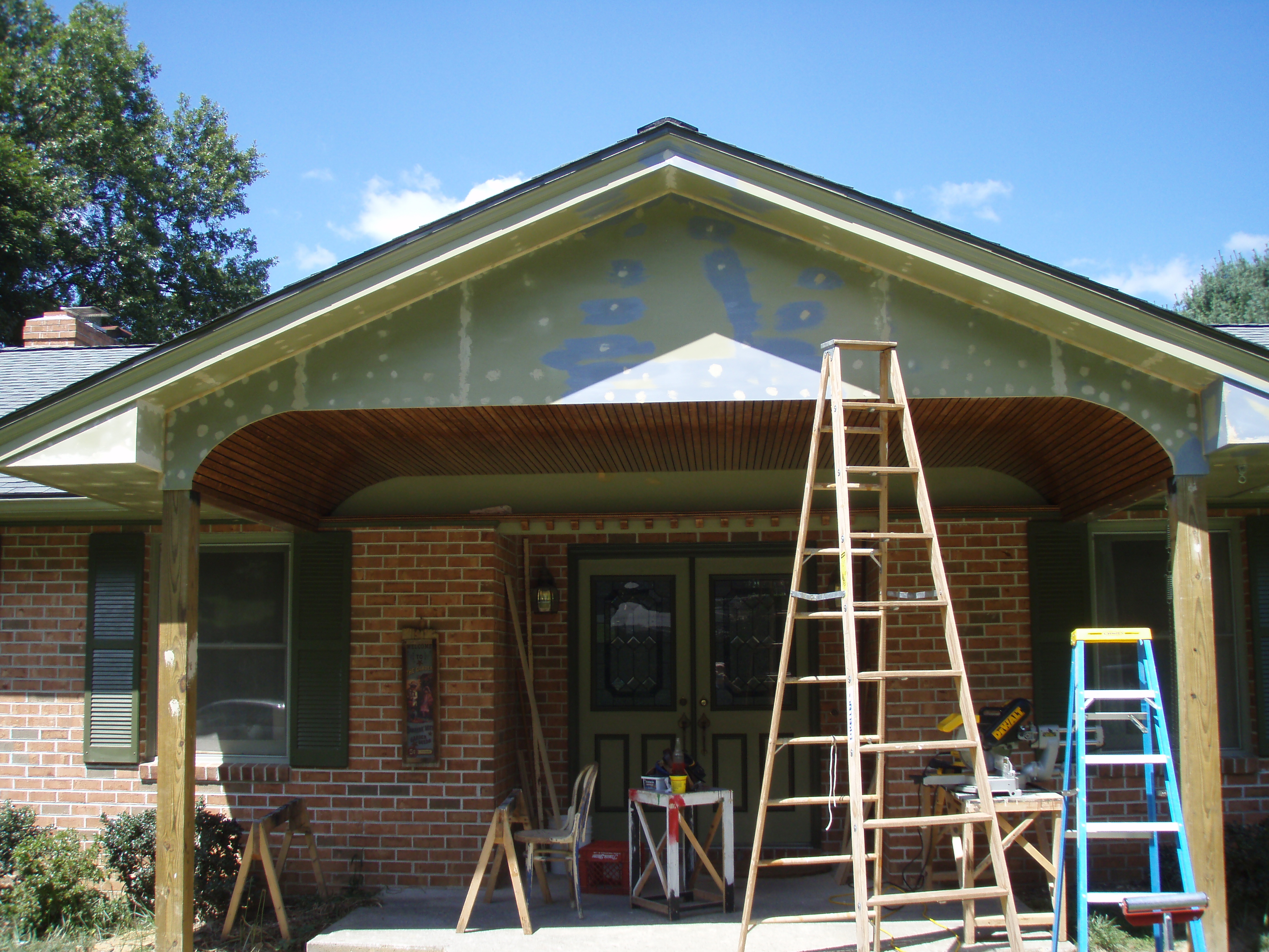 front gable porch with brick raised garden