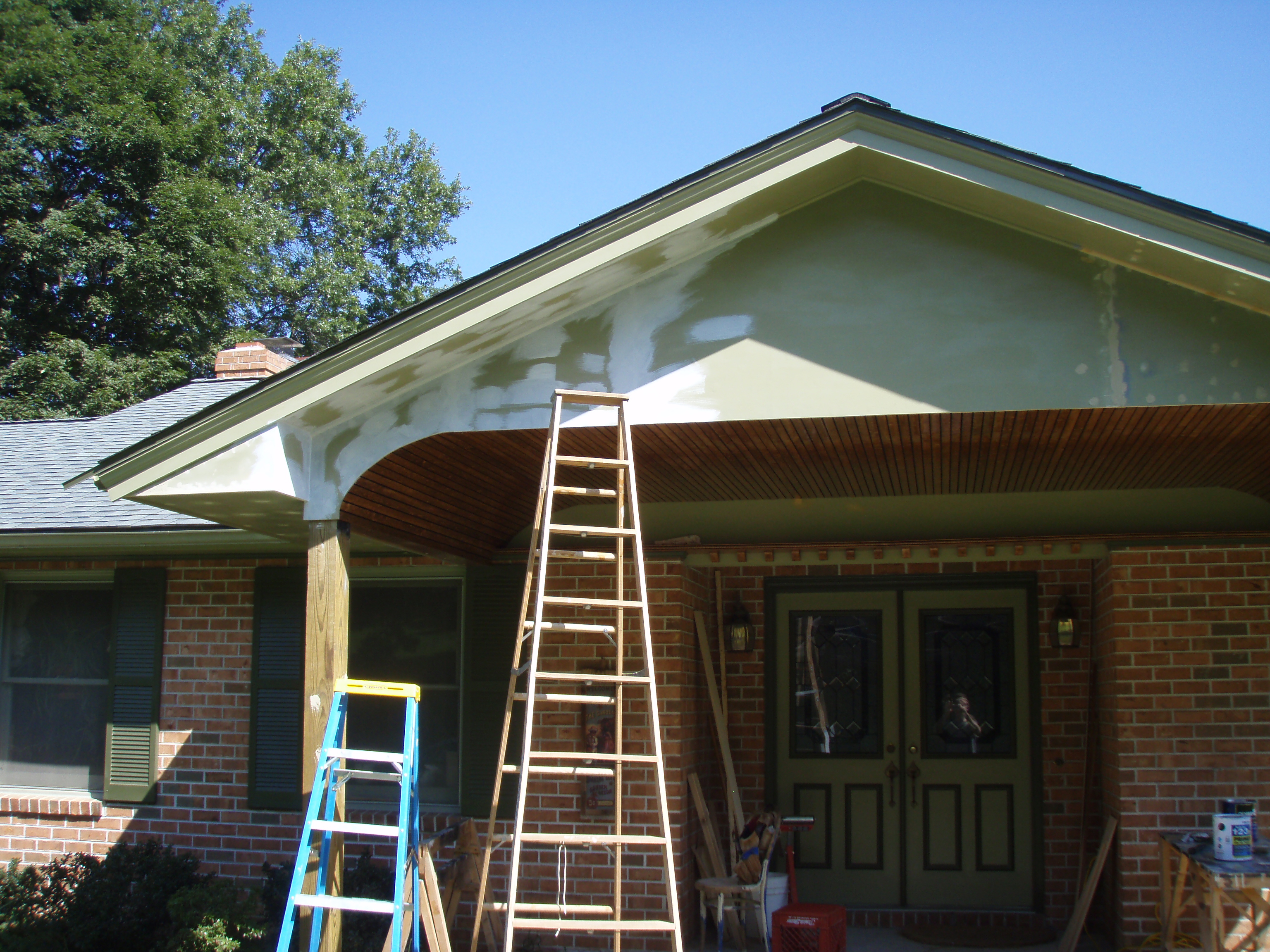 front gable porch with brick raised garden