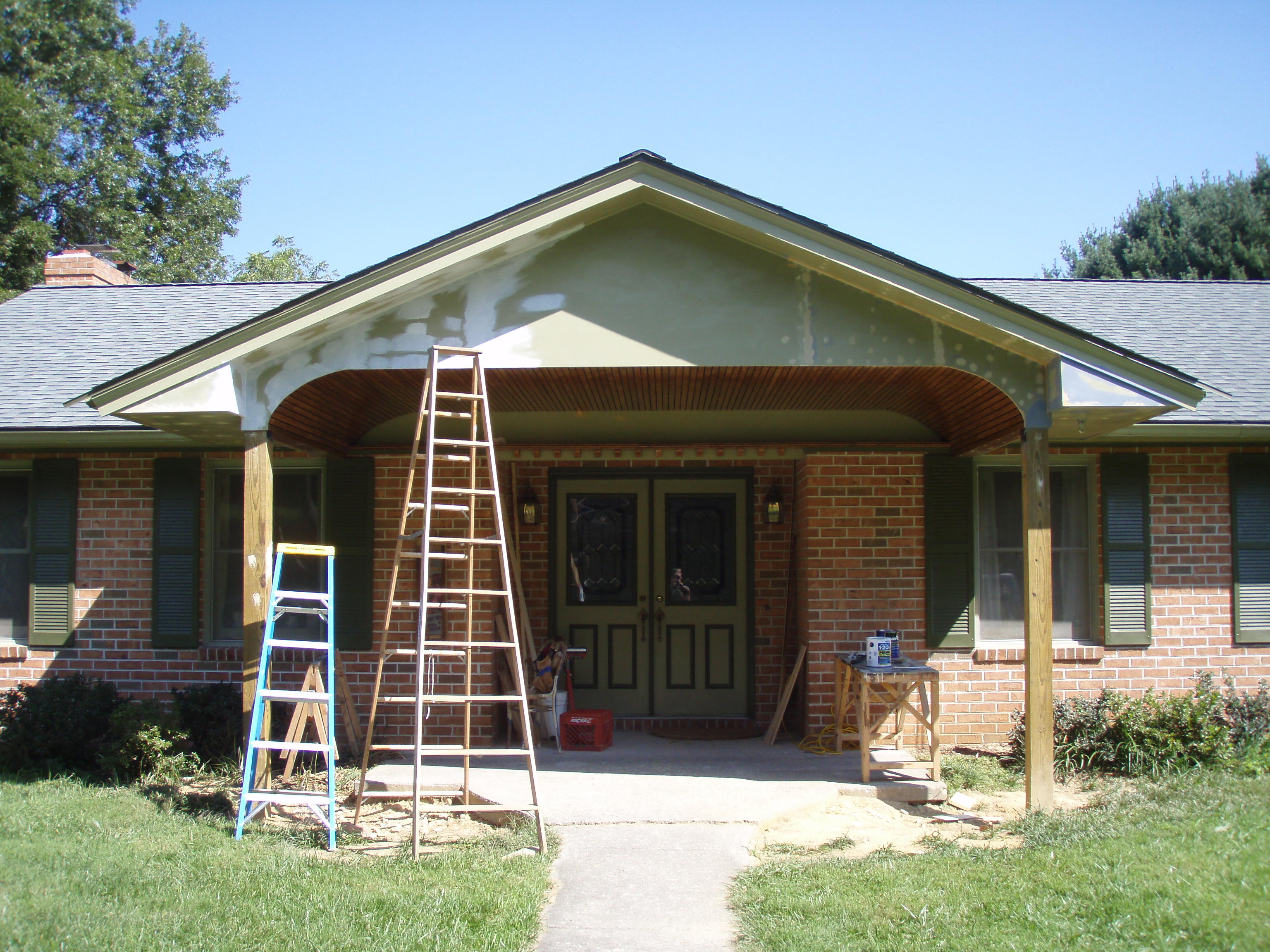 front gable porch with brick raised garden