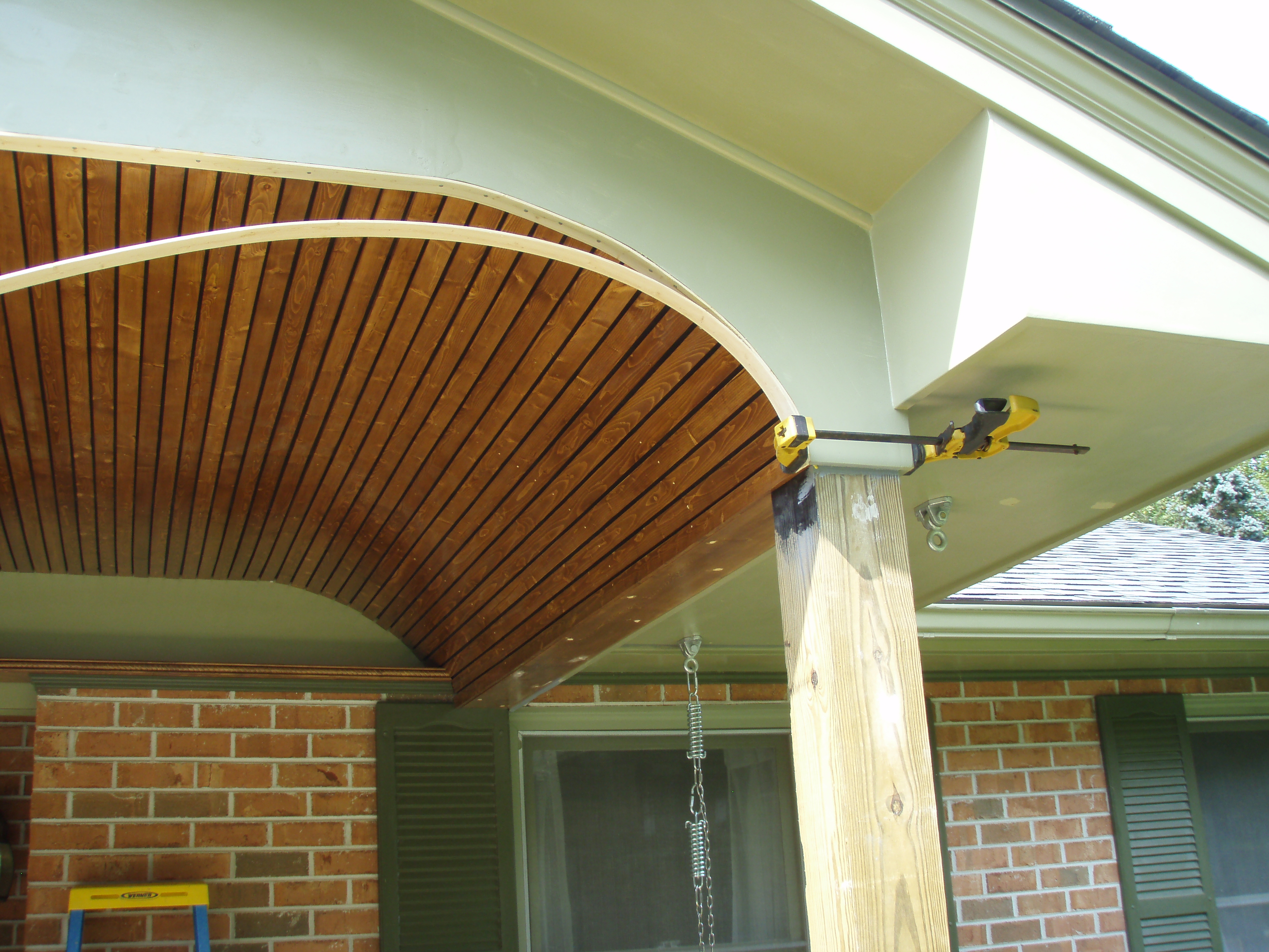 front gable porch with brick raised garden